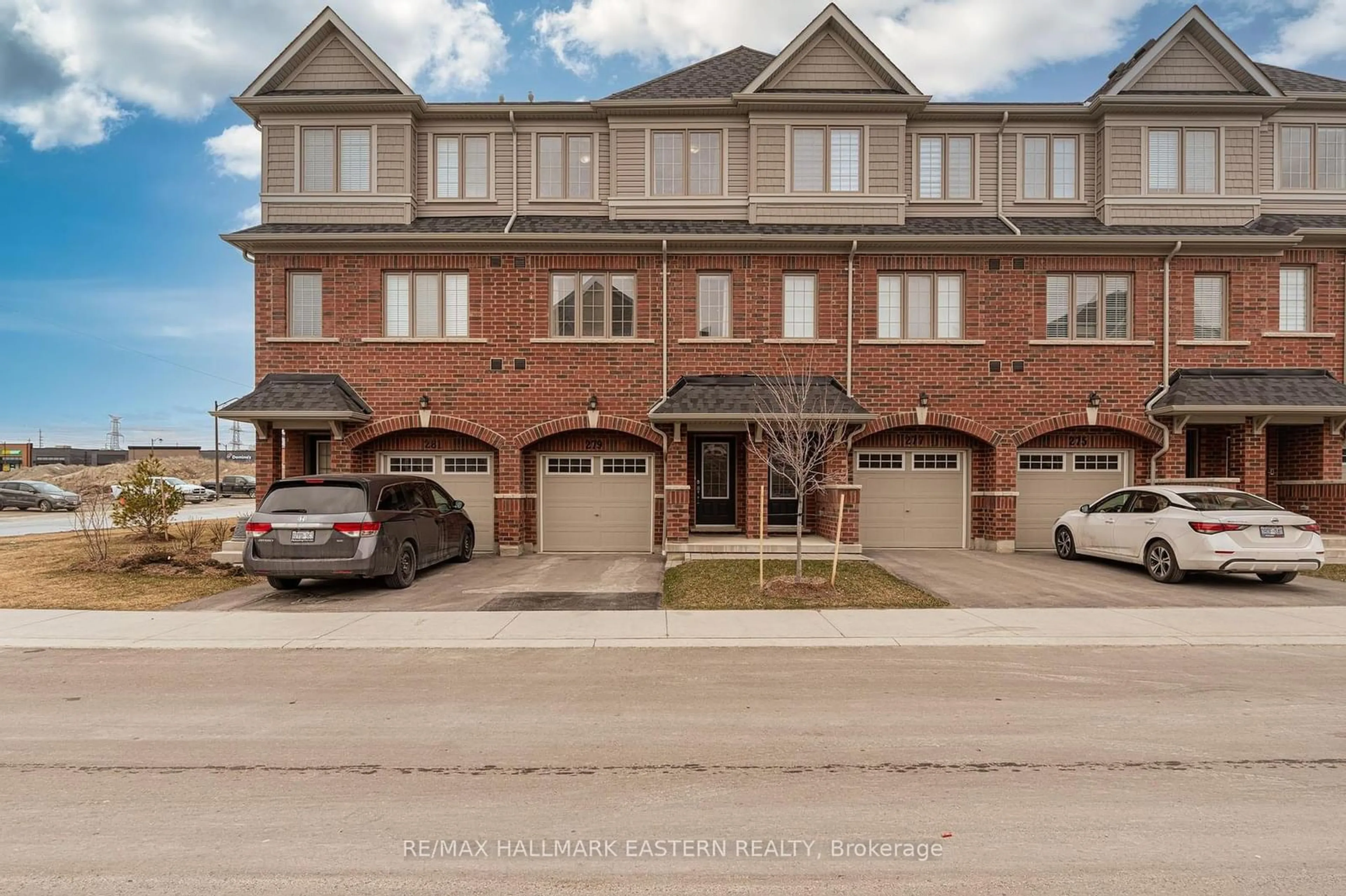 A pic from exterior of the house or condo, the street view for 279 Danzatore Path #9, Oshawa Ontario L1L 0P9