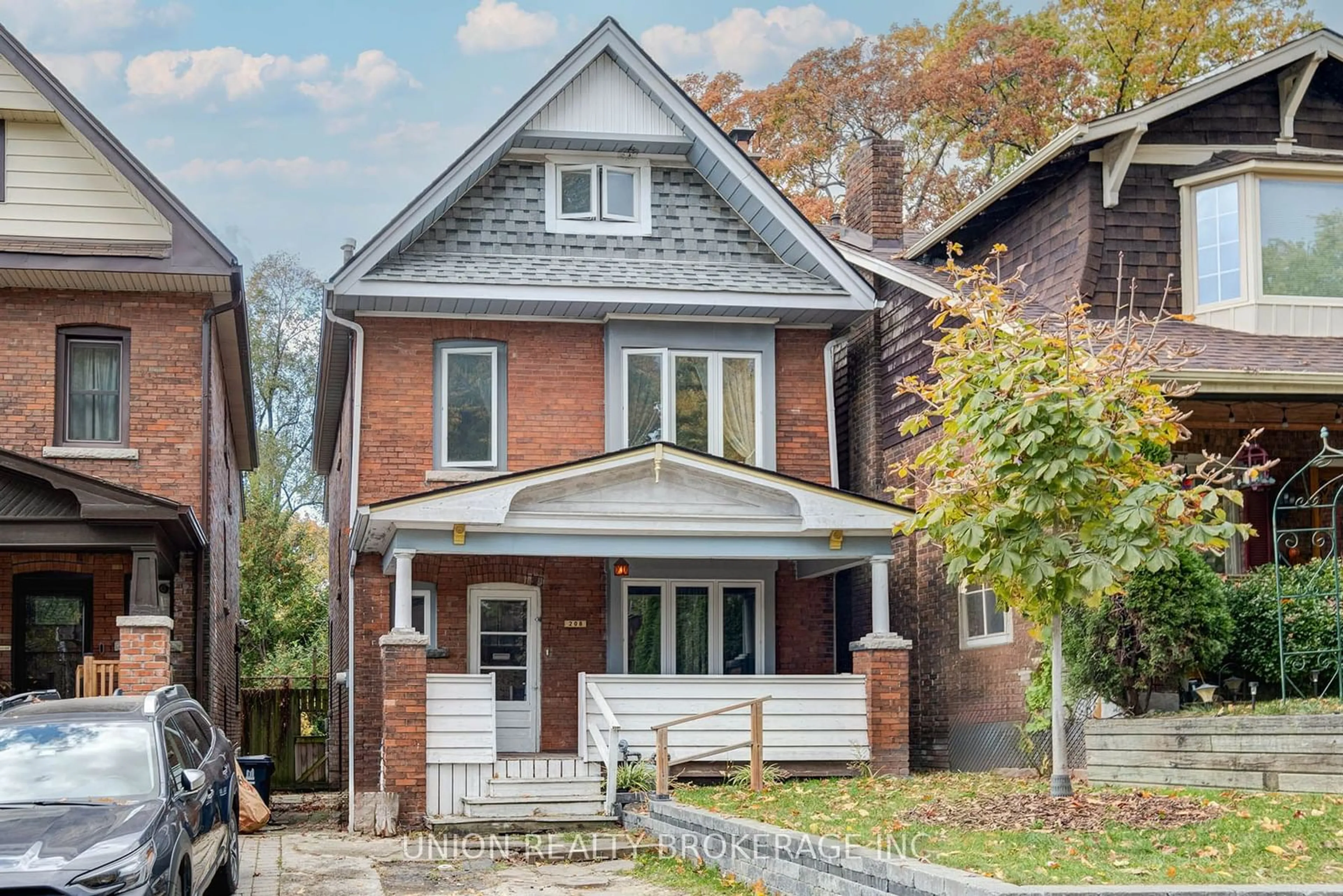 Home with brick exterior material for 208 Gainsborough Rd, Toronto Ontario M4L 3C6