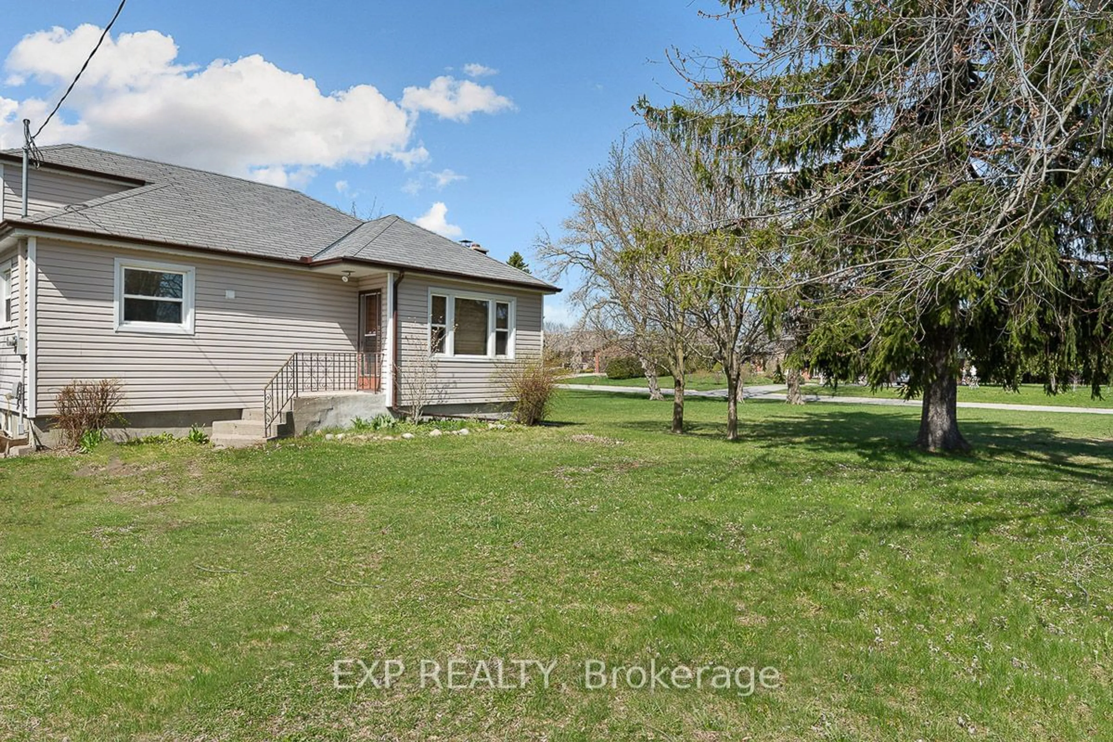 Frontside or backside of a home, the fenced backyard for 2030 Ritson Rd, Oshawa Ontario L1H 8L7