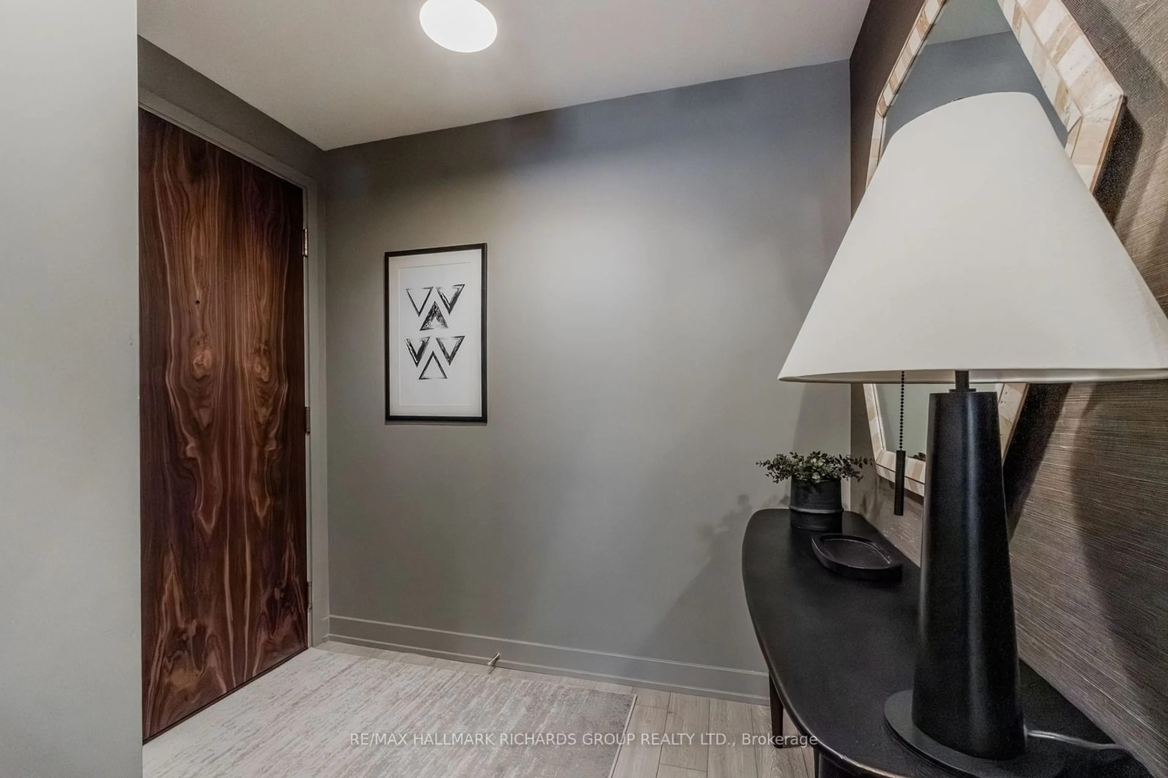 Indoor entryway, wood floors for 665 Queen St #207, Toronto Ontario M4M 0G3