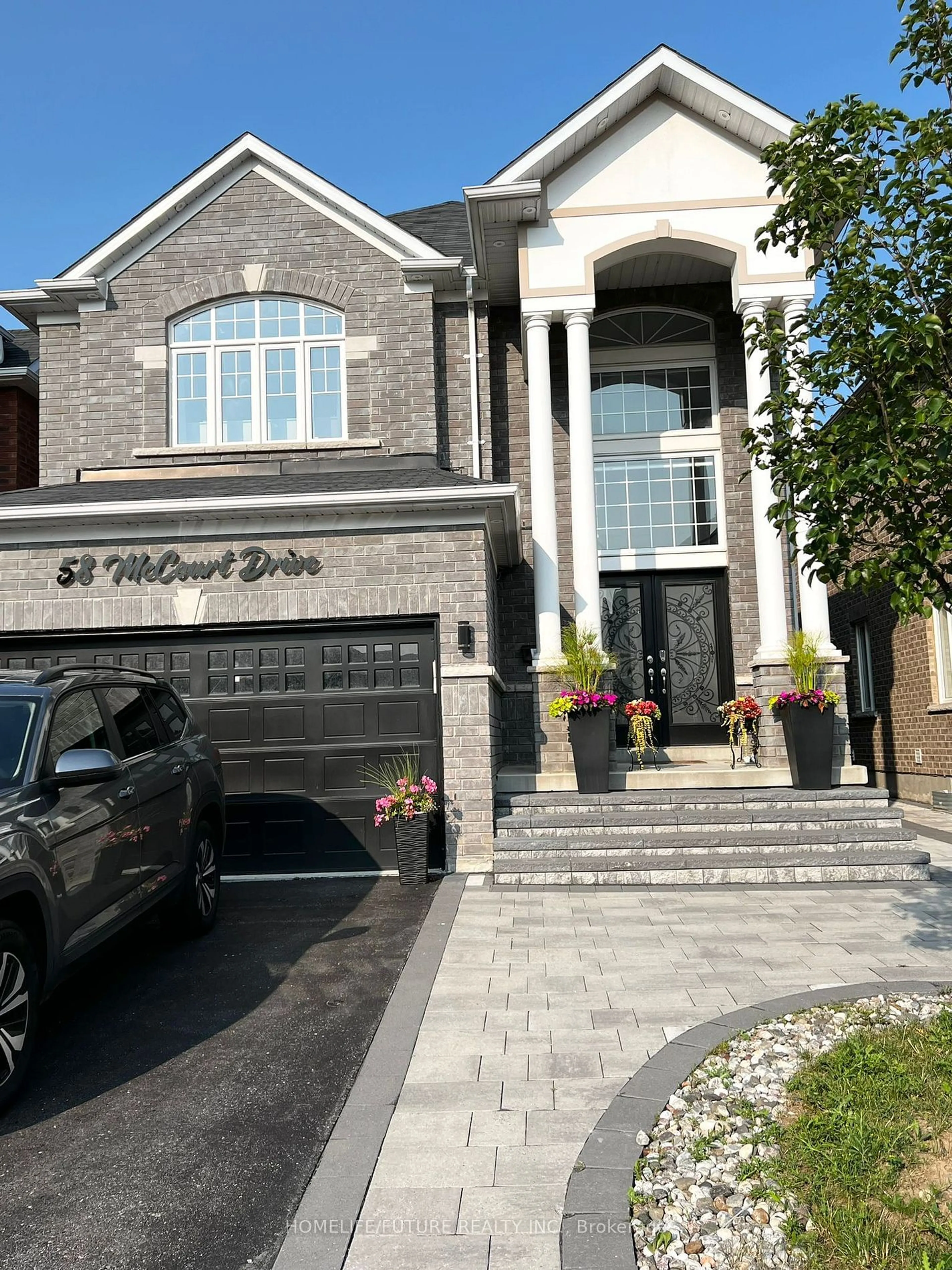 Home with brick exterior material for 58 Mccourt Dr, Ajax Ontario L1Z 0P1