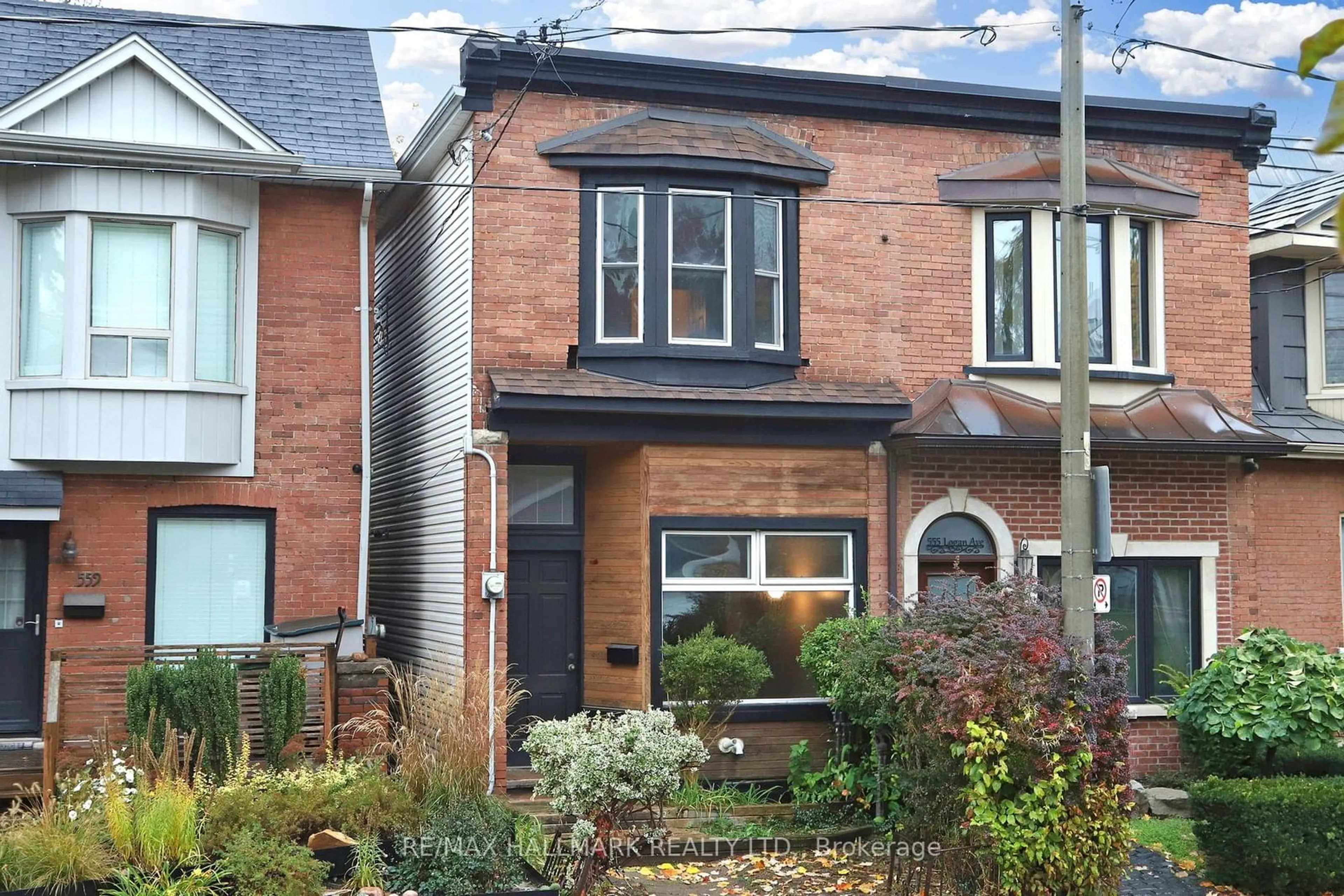 Home with brick exterior material for 557 Logan Ave, Toronto Ontario M4K 3B6