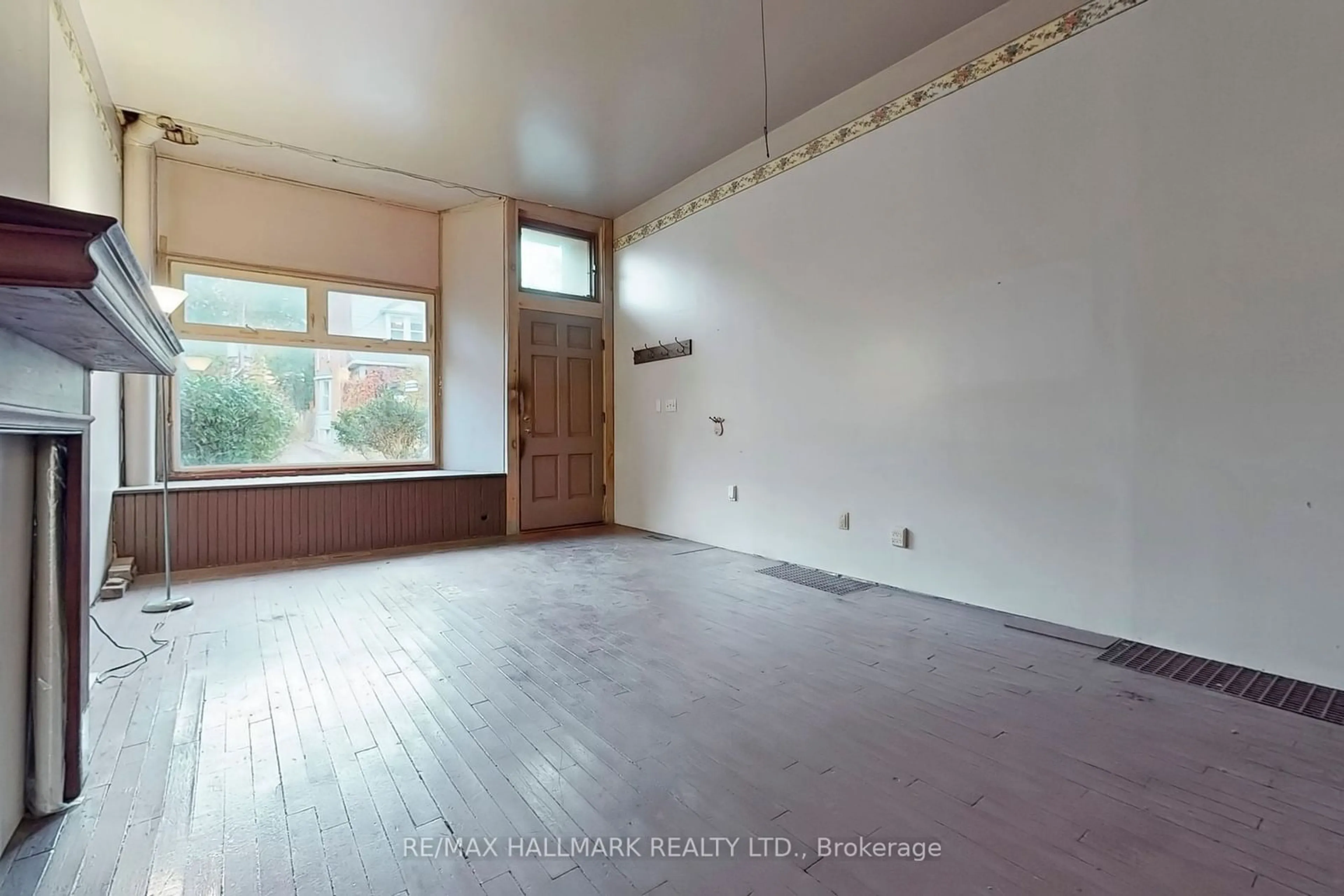 A pic of a room, not visible floor for 557 Logan Ave, Toronto Ontario M4K 3B6