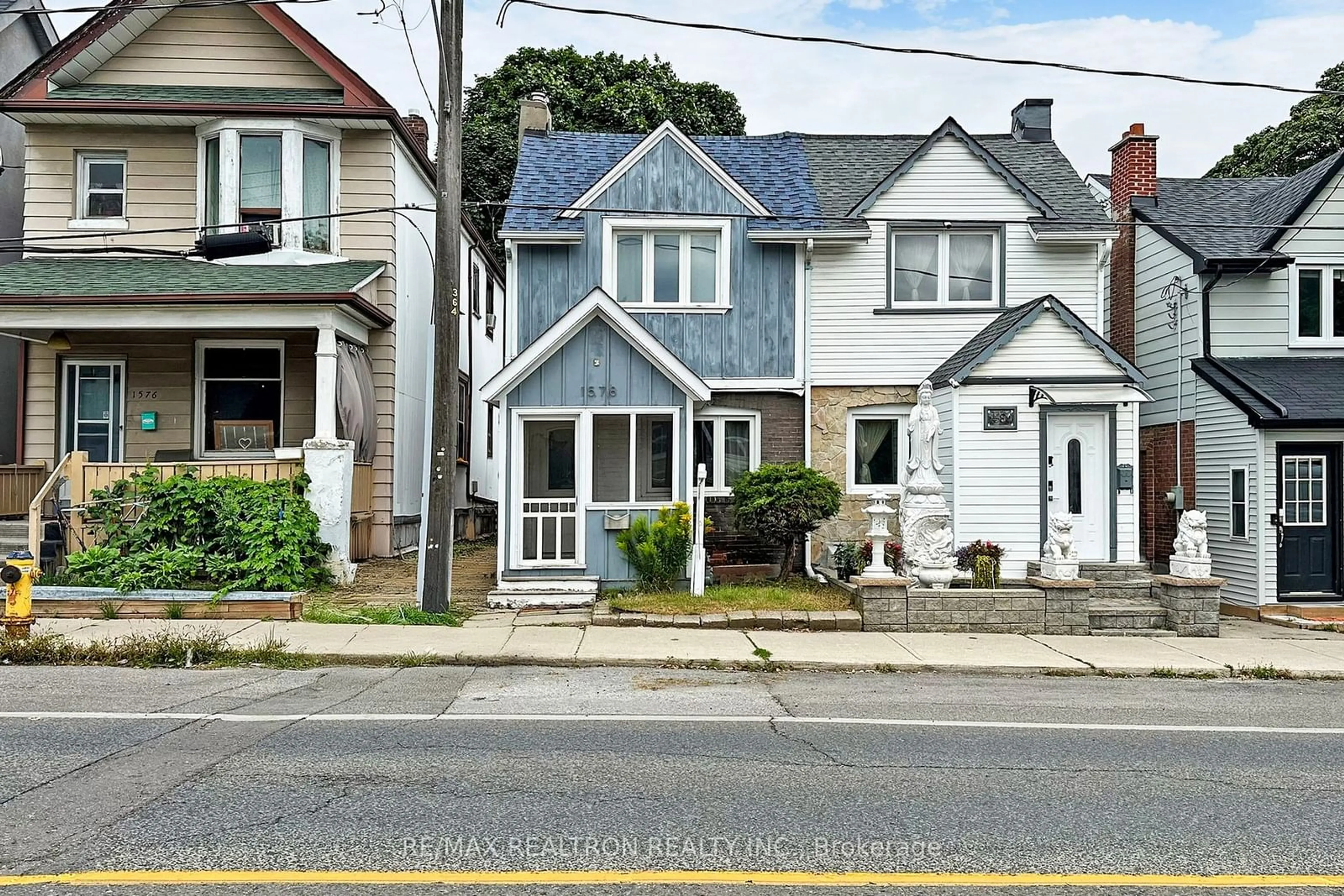 A pic from exterior of the house or condo, the street view for 1578 Dundas St, Toronto Ontario M4L 1K8