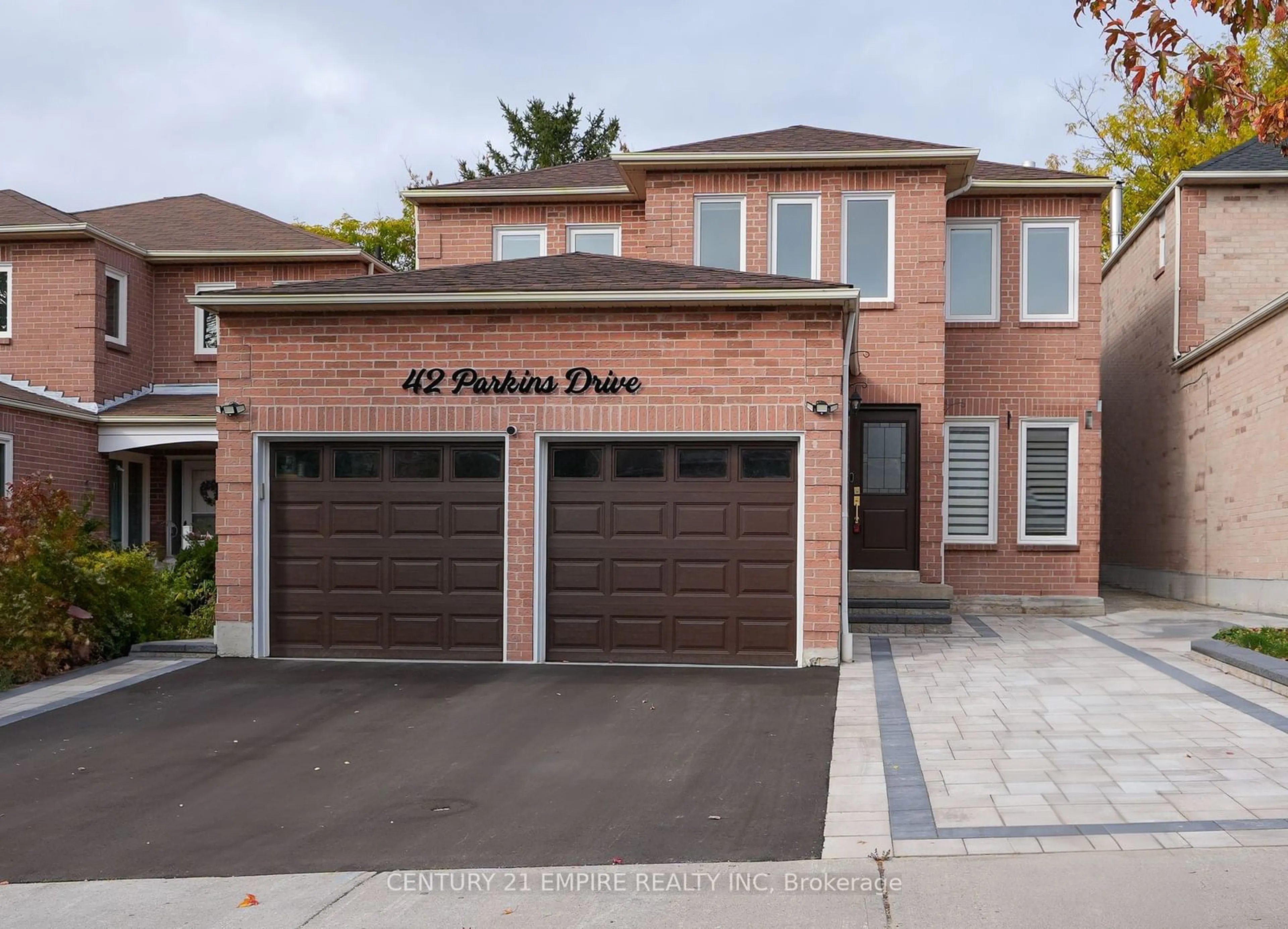 Home with brick exterior material for 42 Parkins Dr, Ajax Ontario L1T 3L2