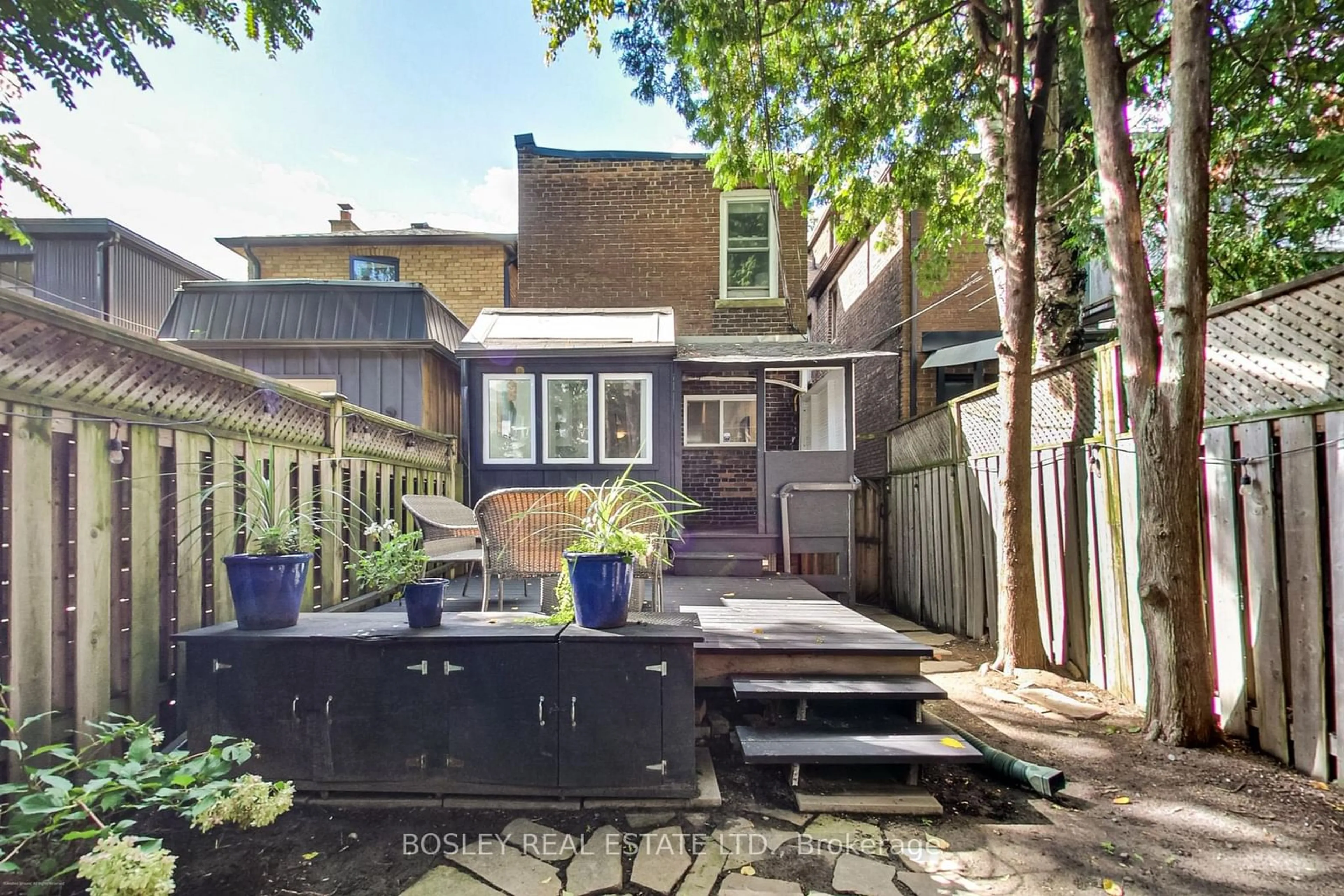 Patio, the fenced backyard for 11 Bertmount Ave, Toronto Ontario M4M 2X8