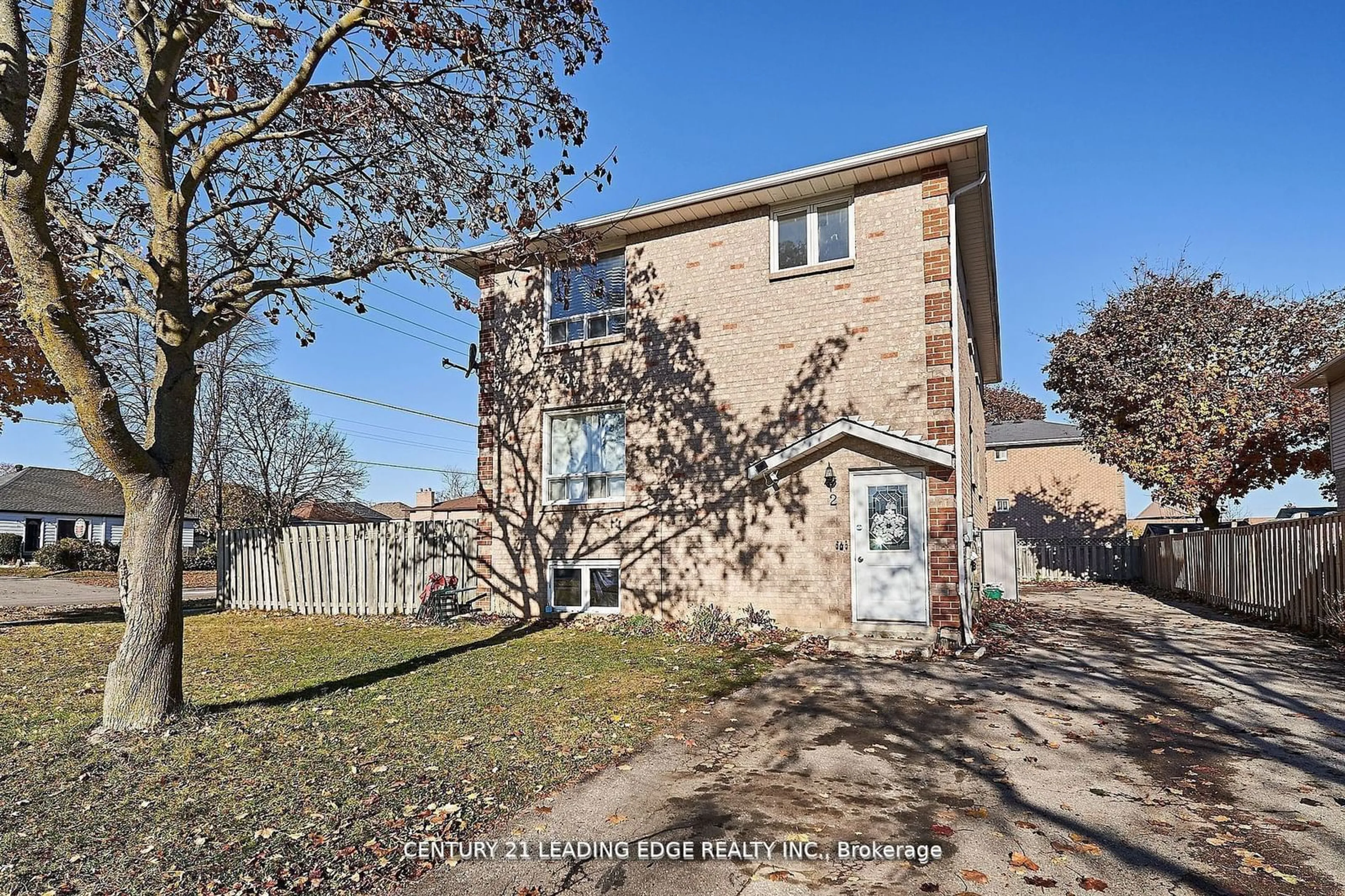 A pic from exterior of the house or condo, the fenced backyard for 2 Kingsway Gate, Clarington Ontario N8M 3C2