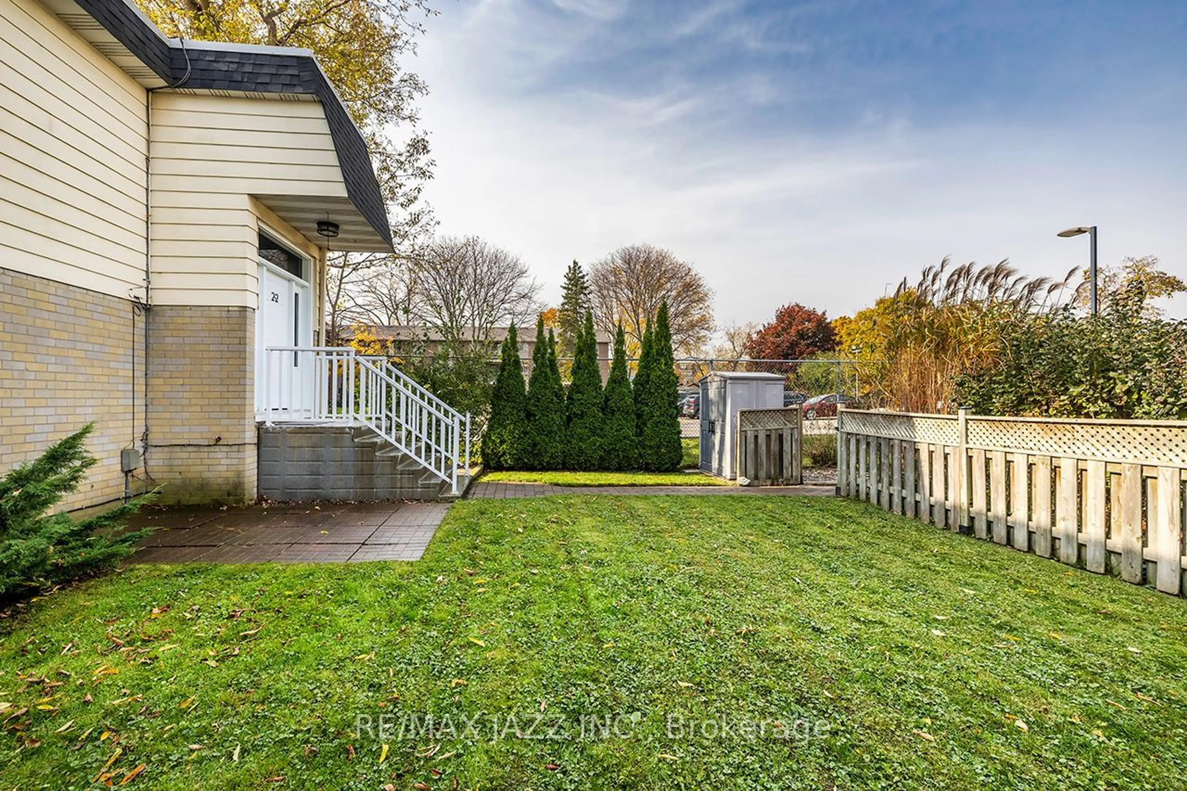 Frontside or backside of a home, the fenced backyard for 540 Mary St #2, Whitby Ontario L1N 2R1