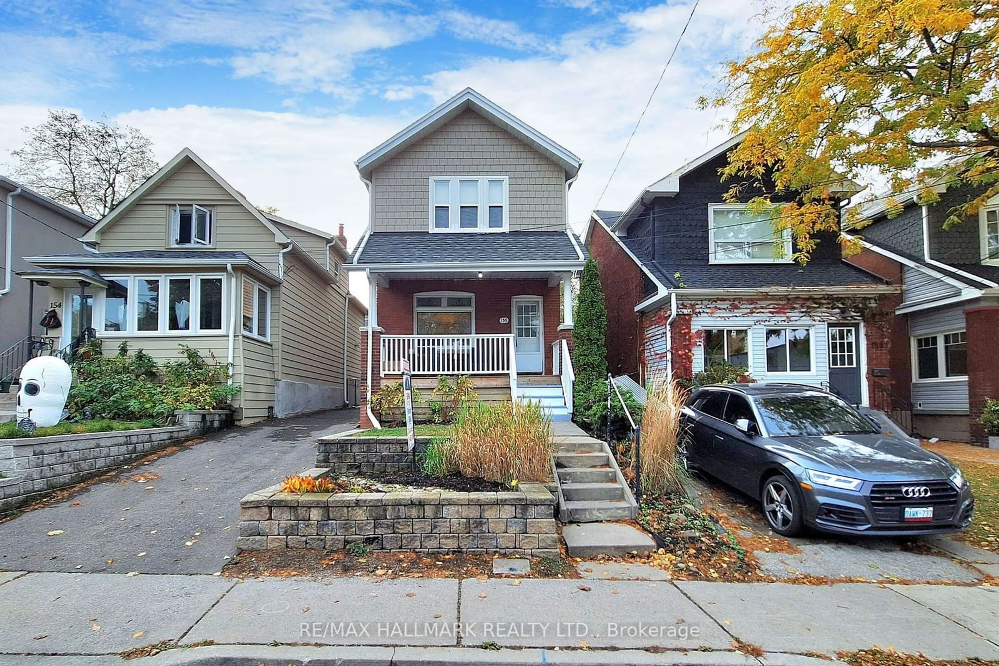 Frontside or backside of a home, the street view for 156 Westlake Ave, Toronto Ontario M4C 4S2