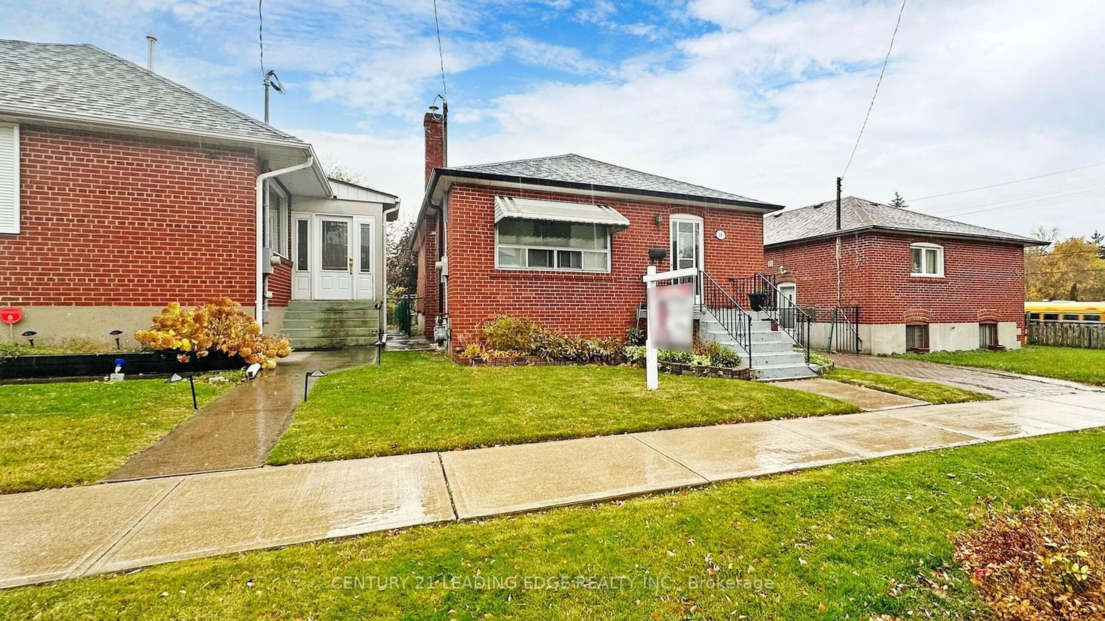 Frontside or backside of a home, the fenced backyard for 68 Marsh Rd, Toronto Ontario M1K 1Y9