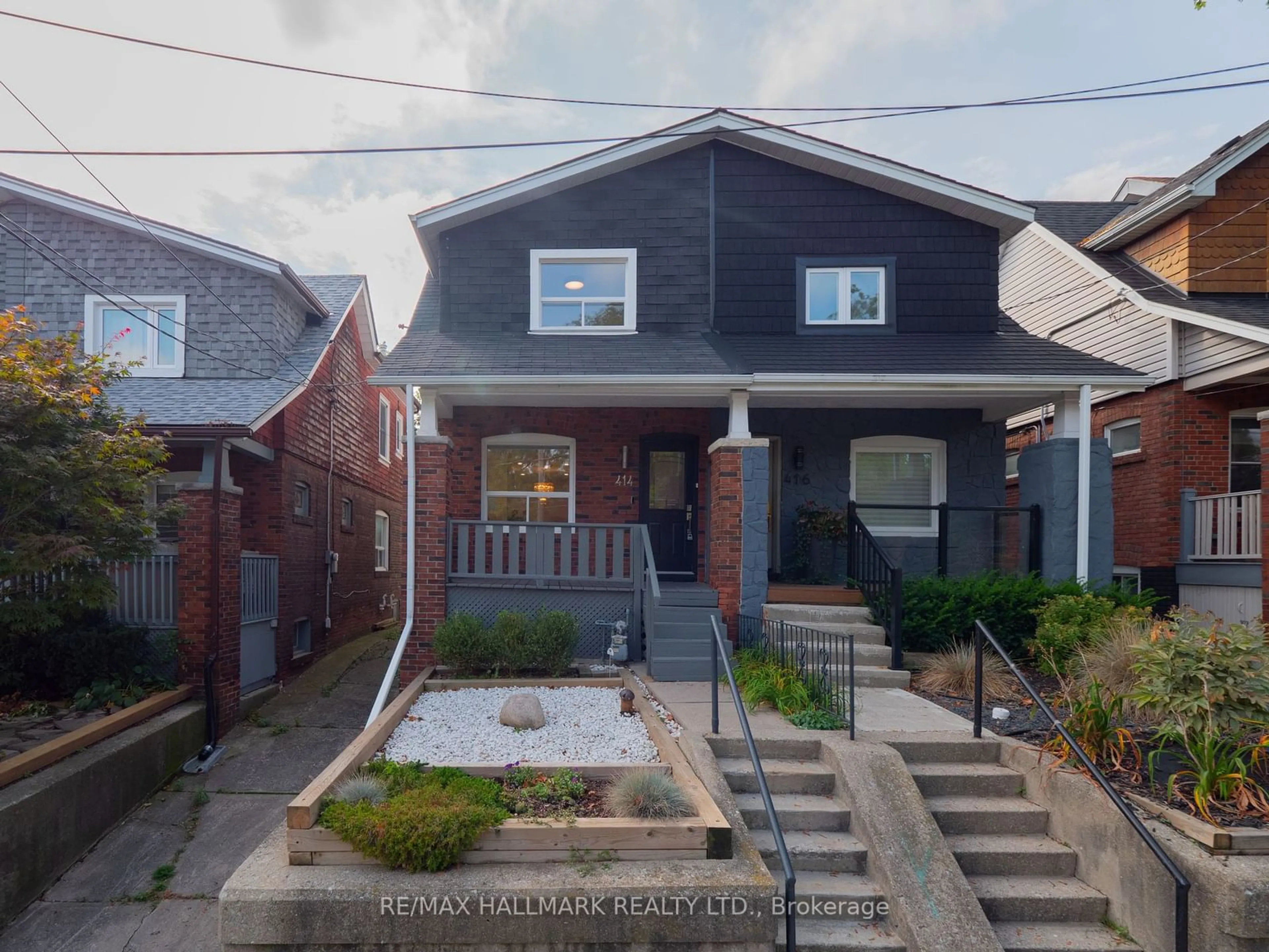 Frontside or backside of a home, the street view for 414 Jones Ave, Toronto Ontario M4J 3G3