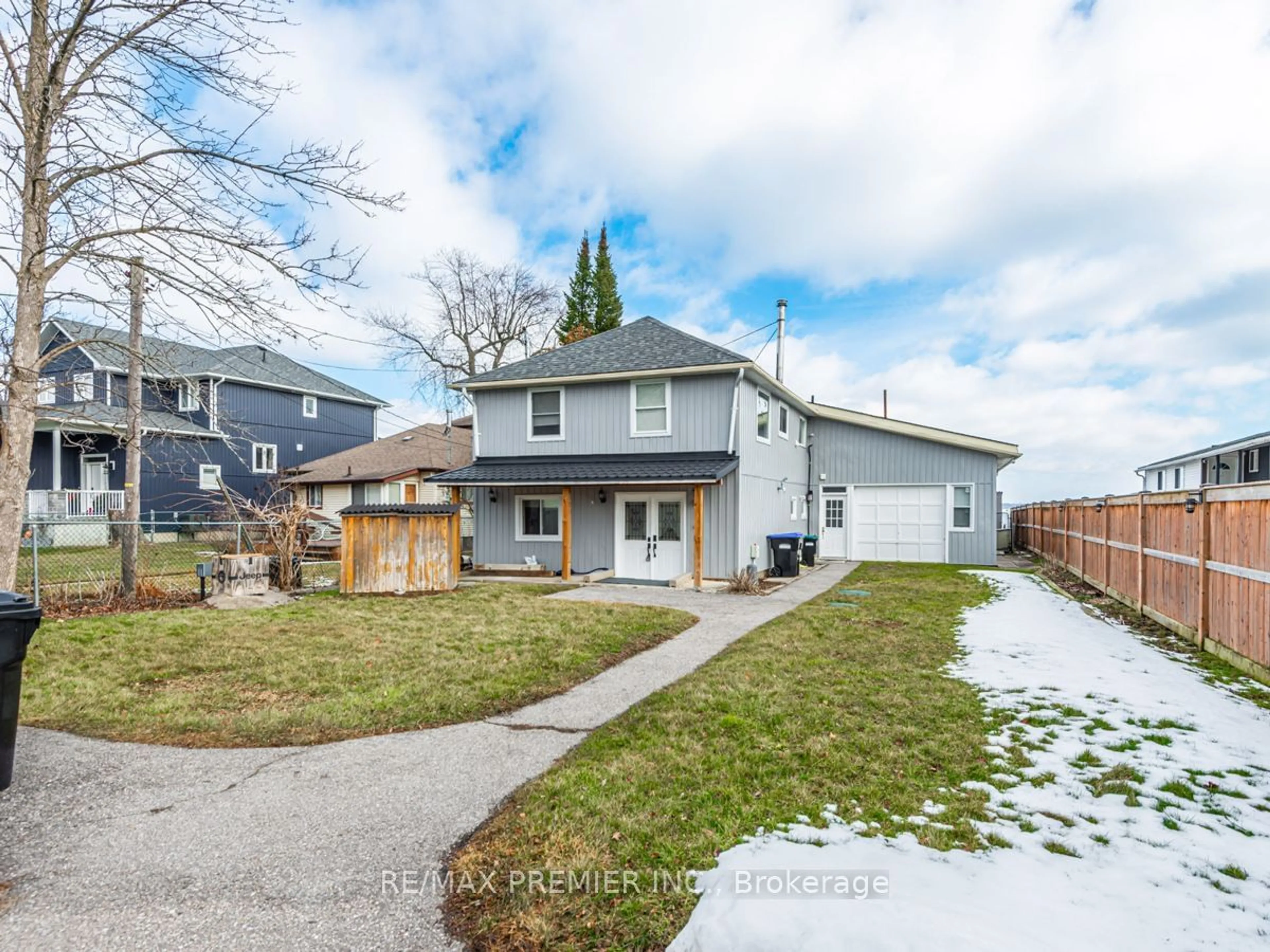 Frontside or backside of a home, the fenced backyard for 359 Limerick St, Innisfil Ontario L0L 1K0