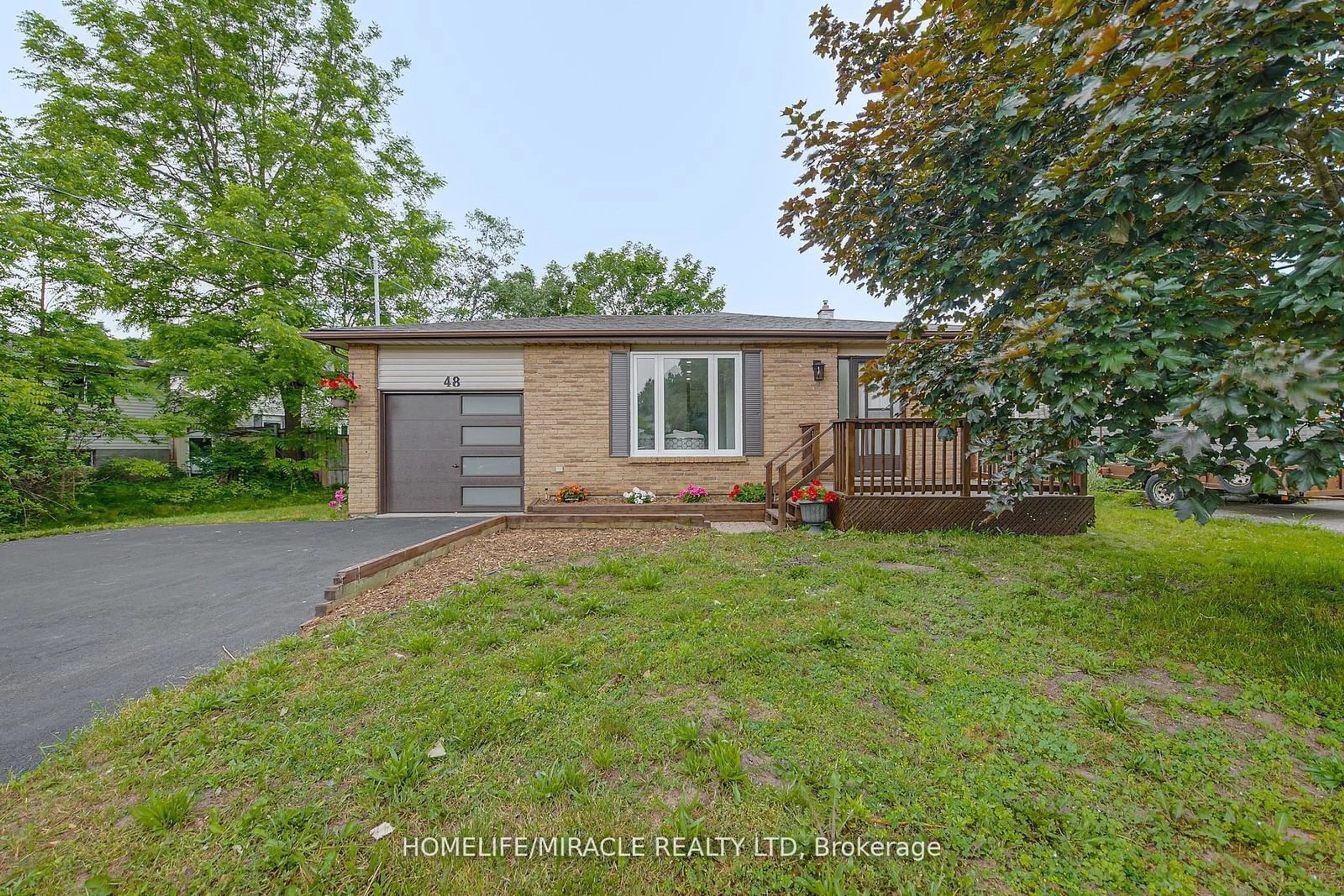 Frontside or backside of a home, cottage for 48 Walnut St, New Tecumseth Ontario L9R 1K2