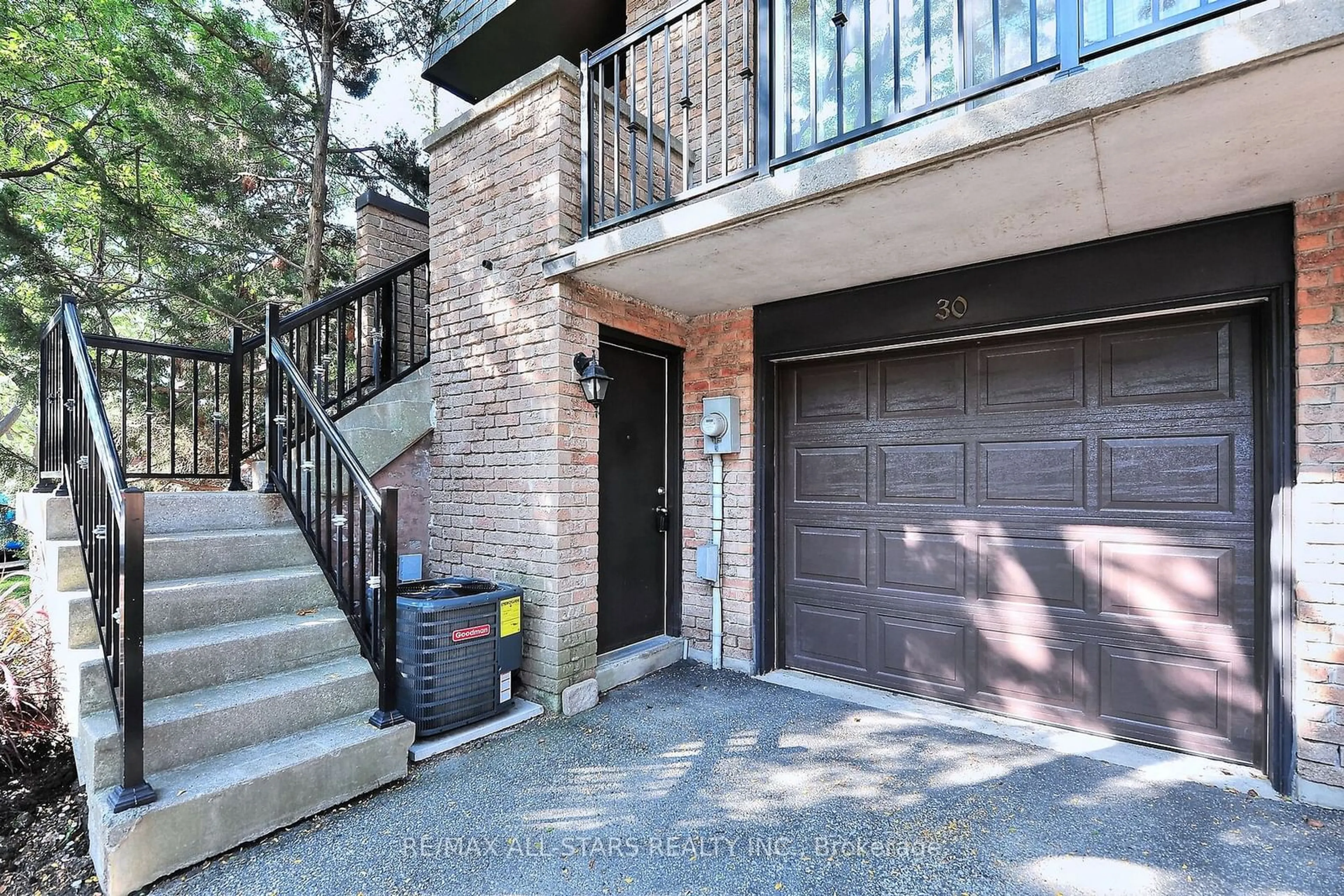 A pic from exterior of the house or condo, the street view for 30 Ashglen Way #30, Markham Ontario L3R 3A7