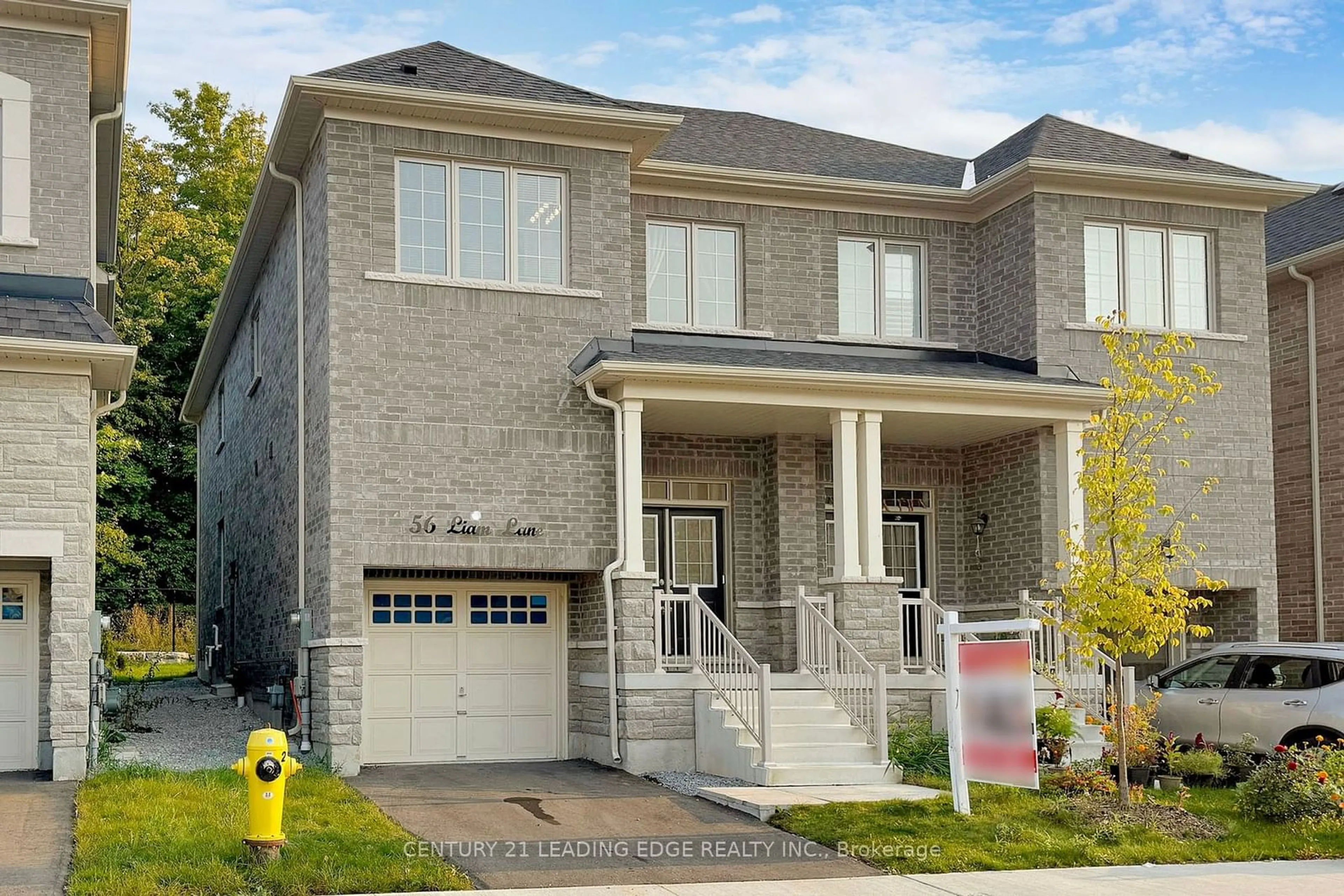 Home with brick exterior material for 56 Liam Lane, Markham Ontario L3S 0E8