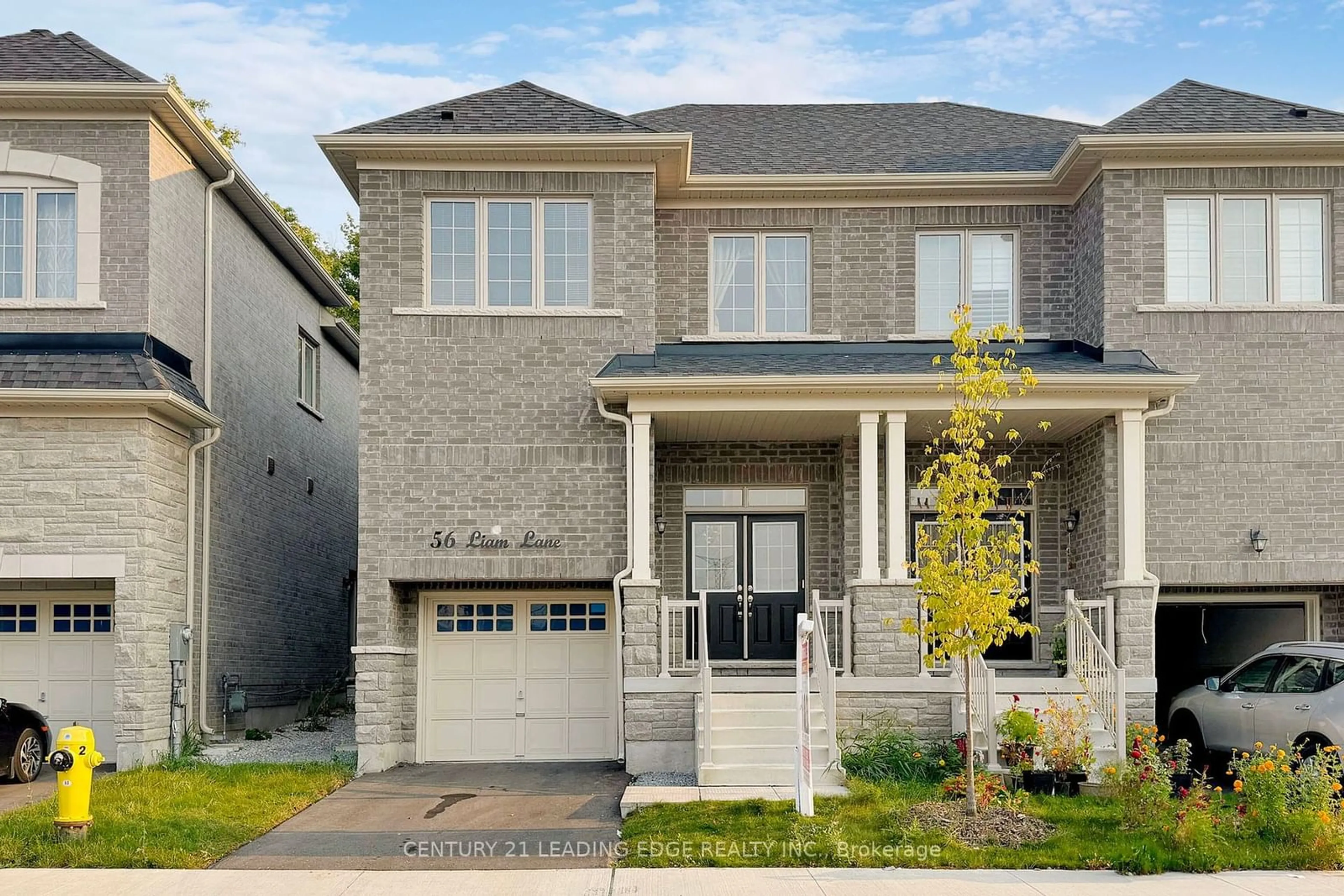 Home with brick exterior material for 56 Liam Lane, Markham Ontario L3S 0E8