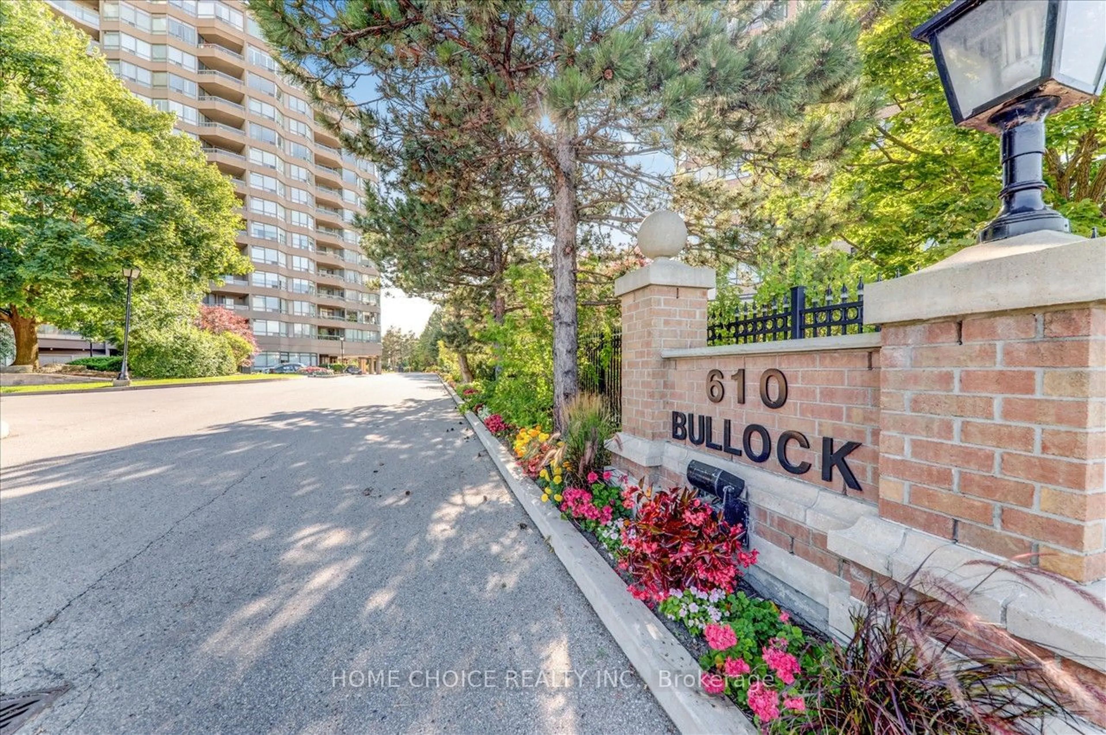 A pic from exterior of the house or condo, the street view for 610 Bullock Dr #217, Markham Ontario L3R 0G1