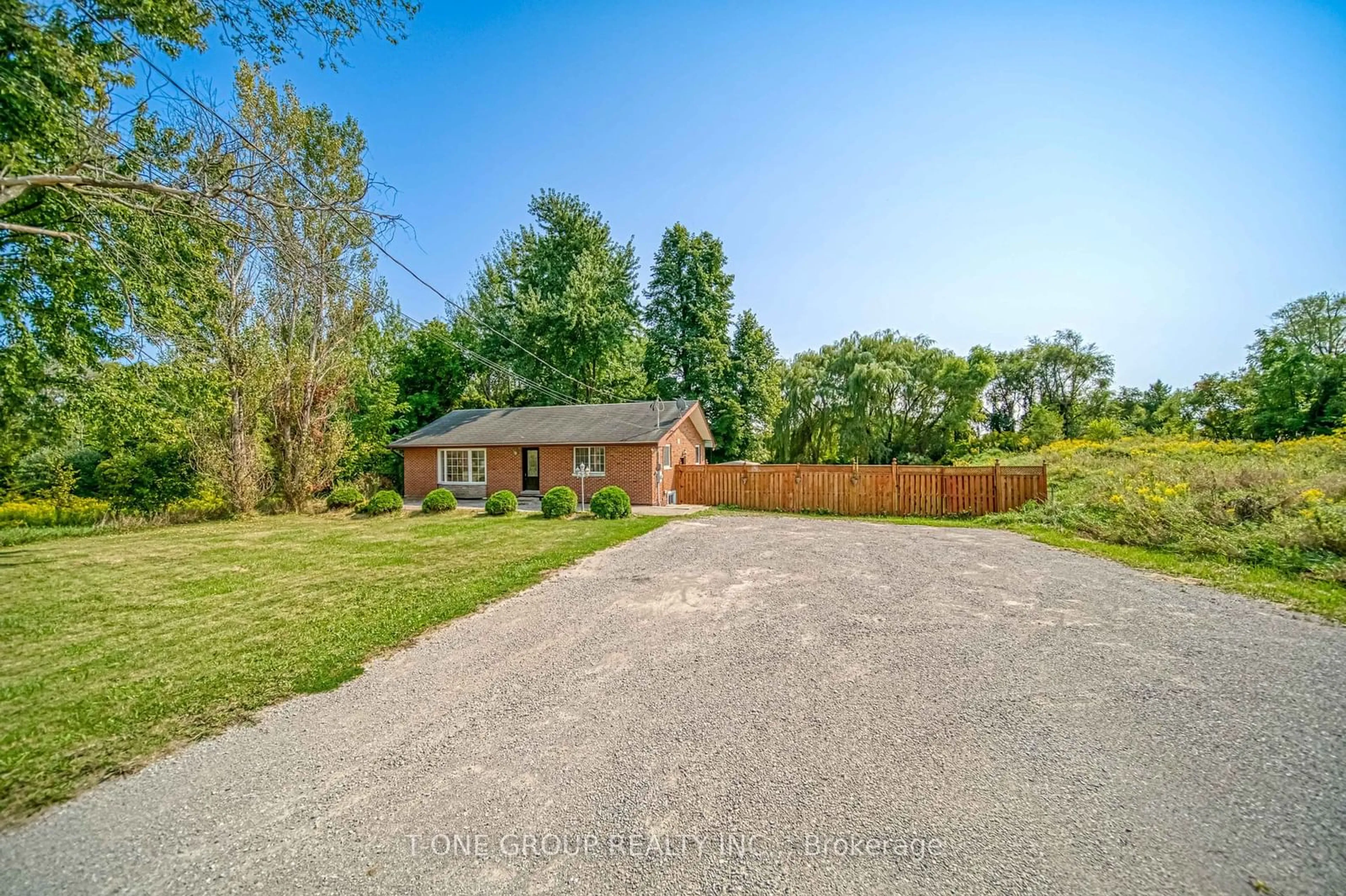 Frontside or backside of a home, the fenced backyard for 947 Mount Albert Rd, East Gwillimbury Ontario L0G 1V0