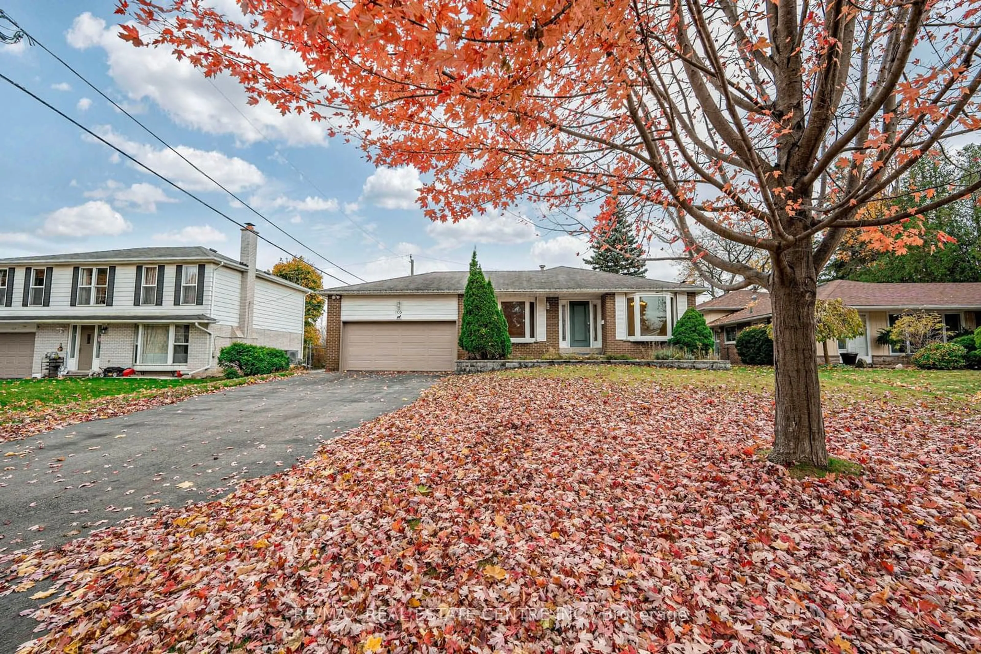 A pic from exterior of the house or condo, the street view for 105 Drakefield Rd, Markham Ontario L3P 1G9