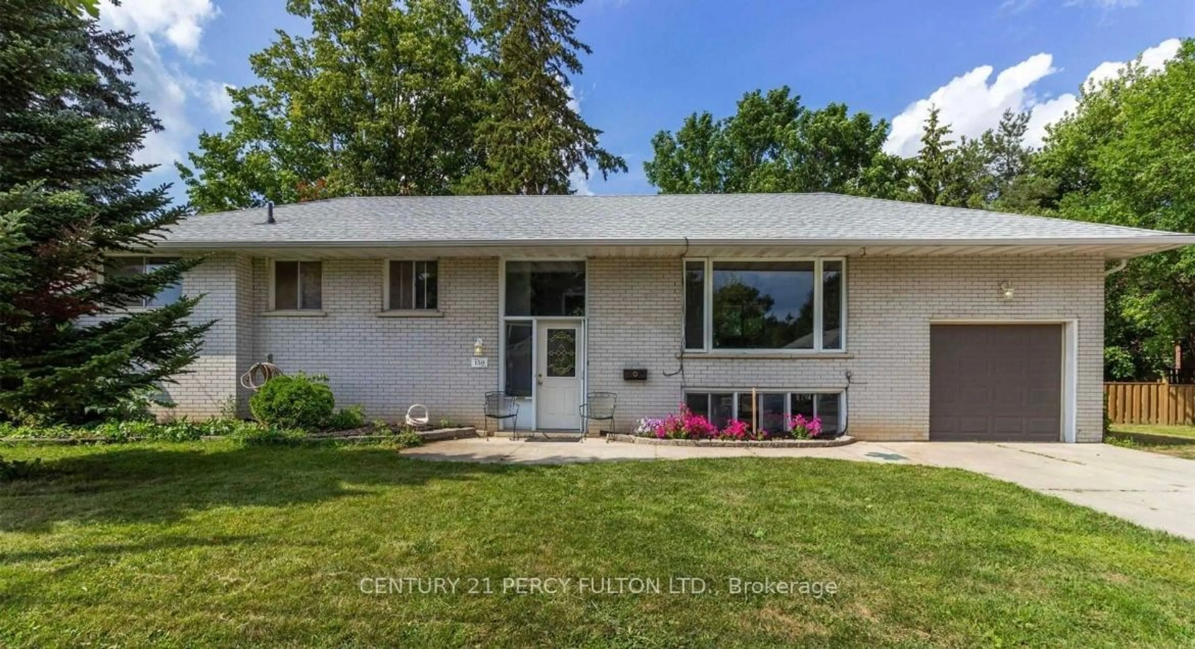 Frontside or backside of a home, the fenced backyard for 150 Nelson St, New Tecumseth Ontario L9R 1J5