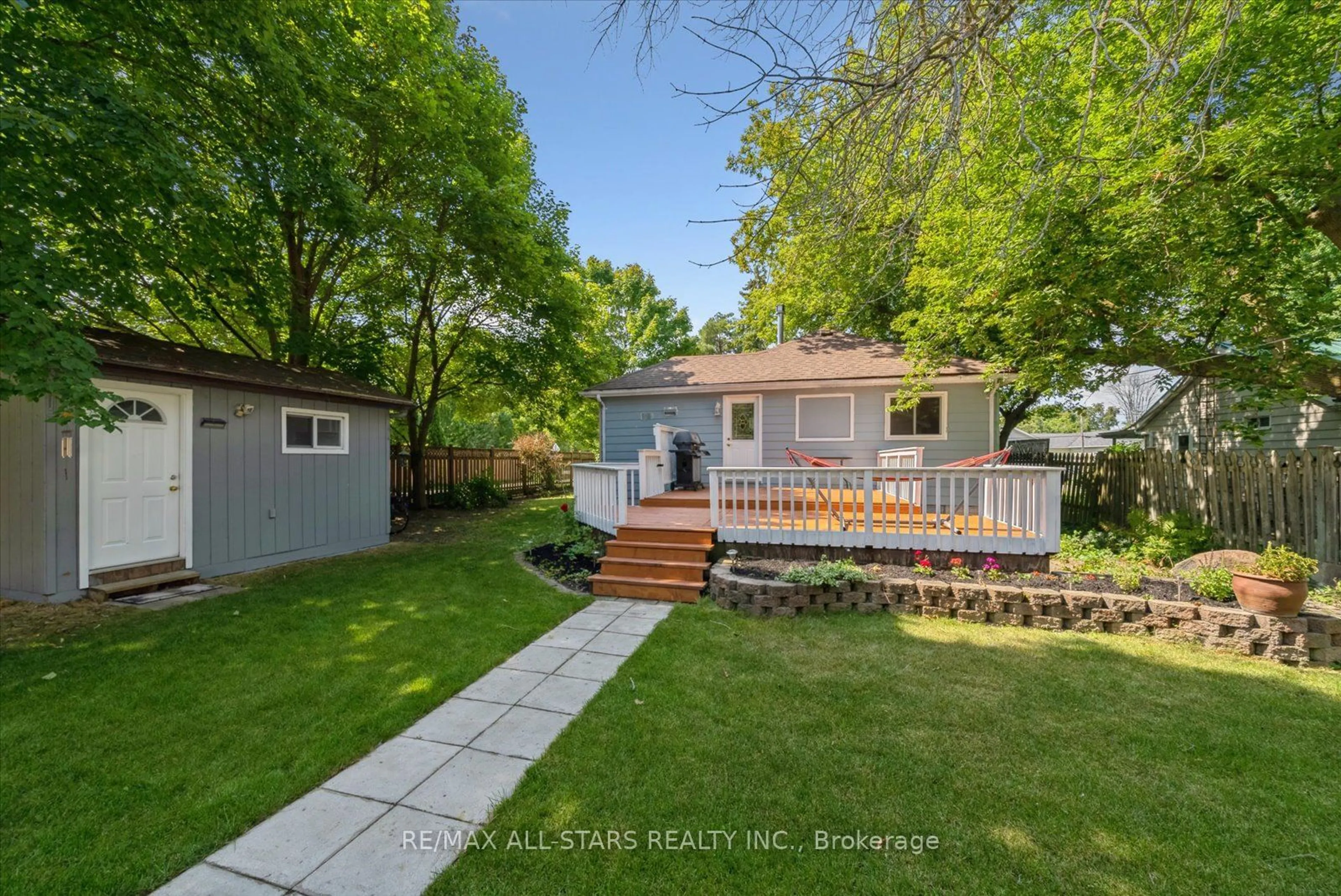 A pic from exterior of the house or condo, the fenced backyard for 787 Churchill Lane, Georgina Ontario L0E 1S0