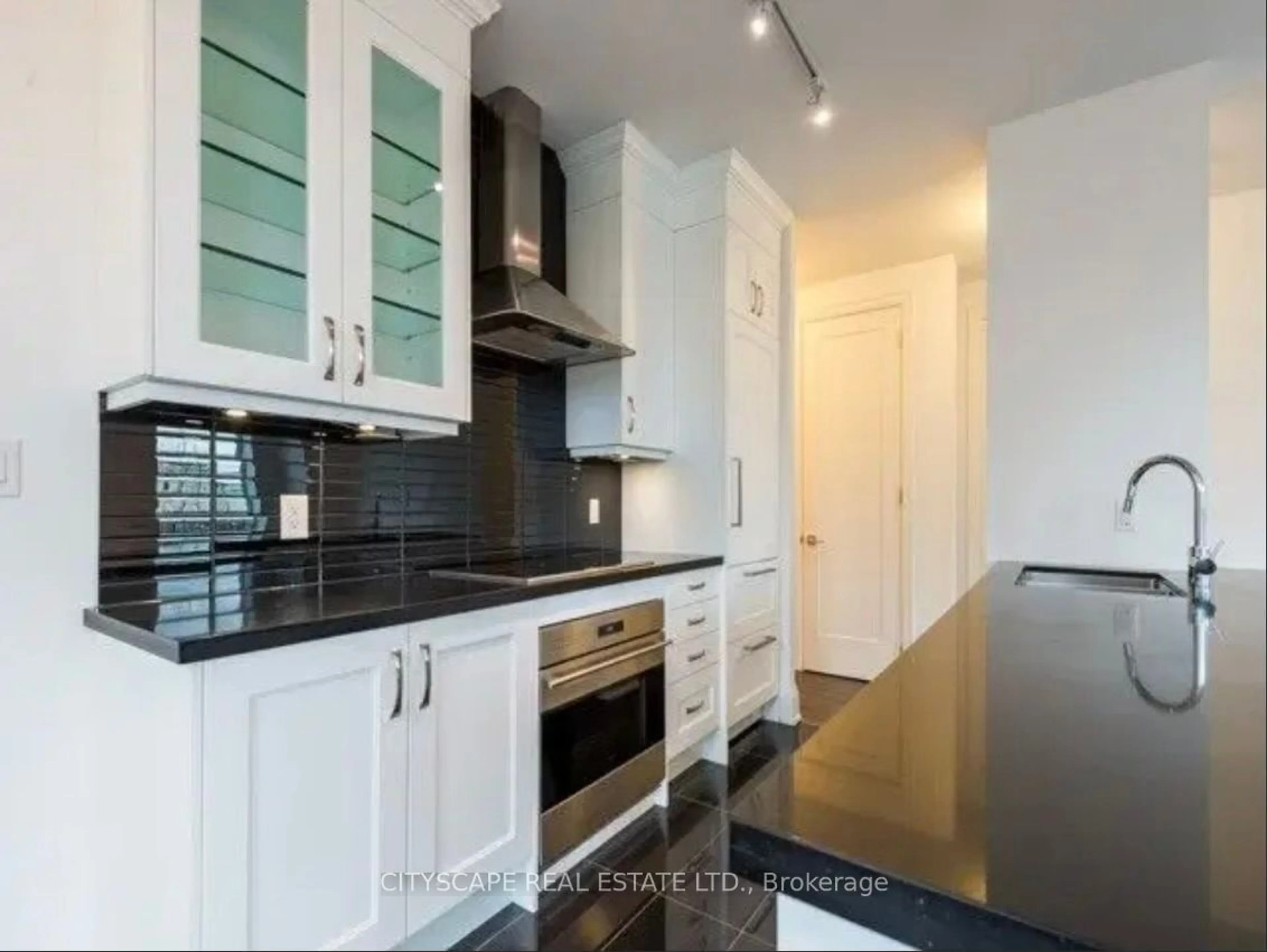 Contemporary kitchen, wood floors for 9 Stollery Pond Cres #212, Markham Ontario L6C 0Y1