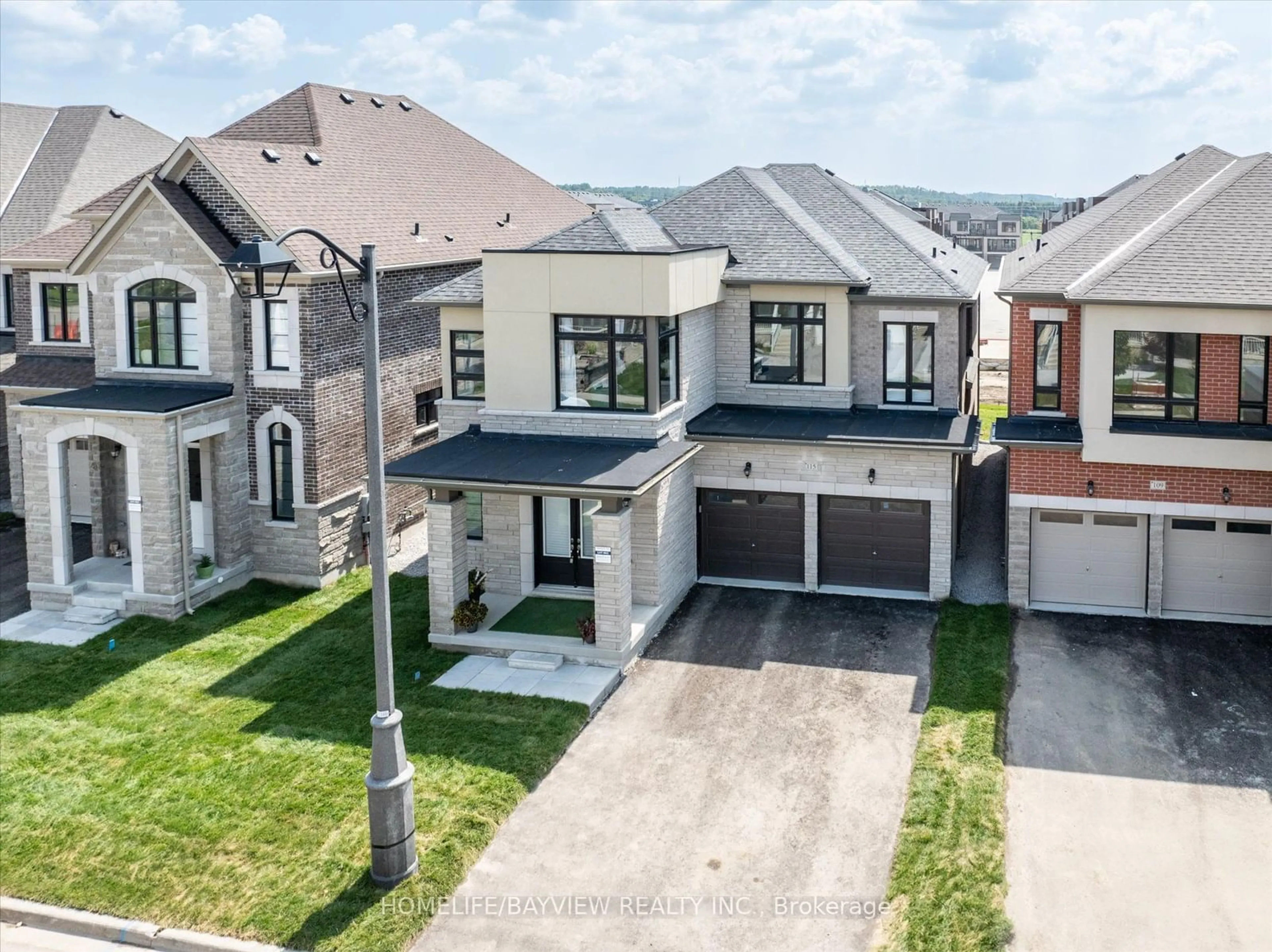 Frontside or backside of a home, the street view for 115 Halldorson Ave, Aurora Ontario L4G 0C5