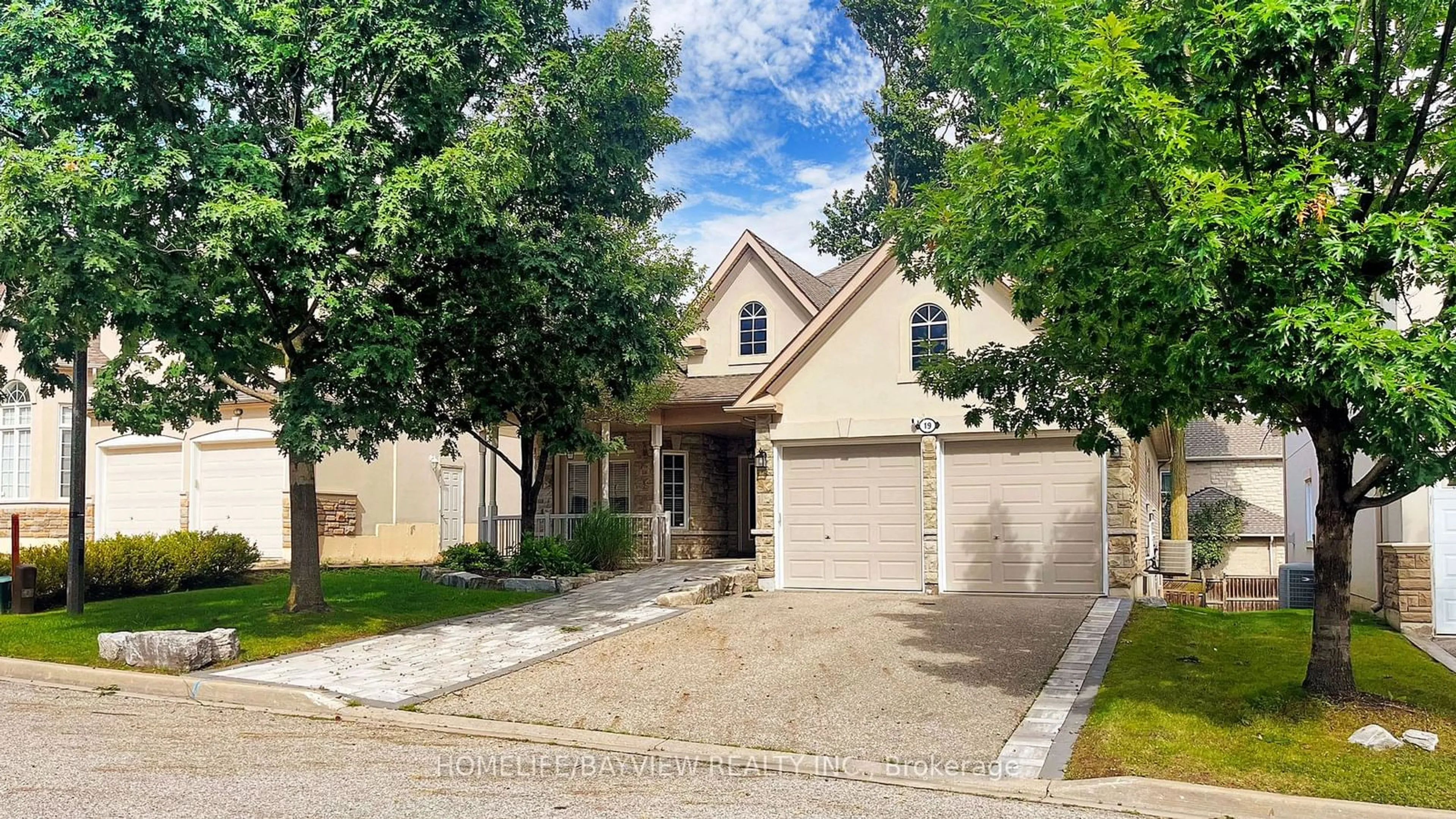 A pic from exterior of the house or condo, the street view for 19 Warden Woods Crt, Markham Ontario L3R 5W5