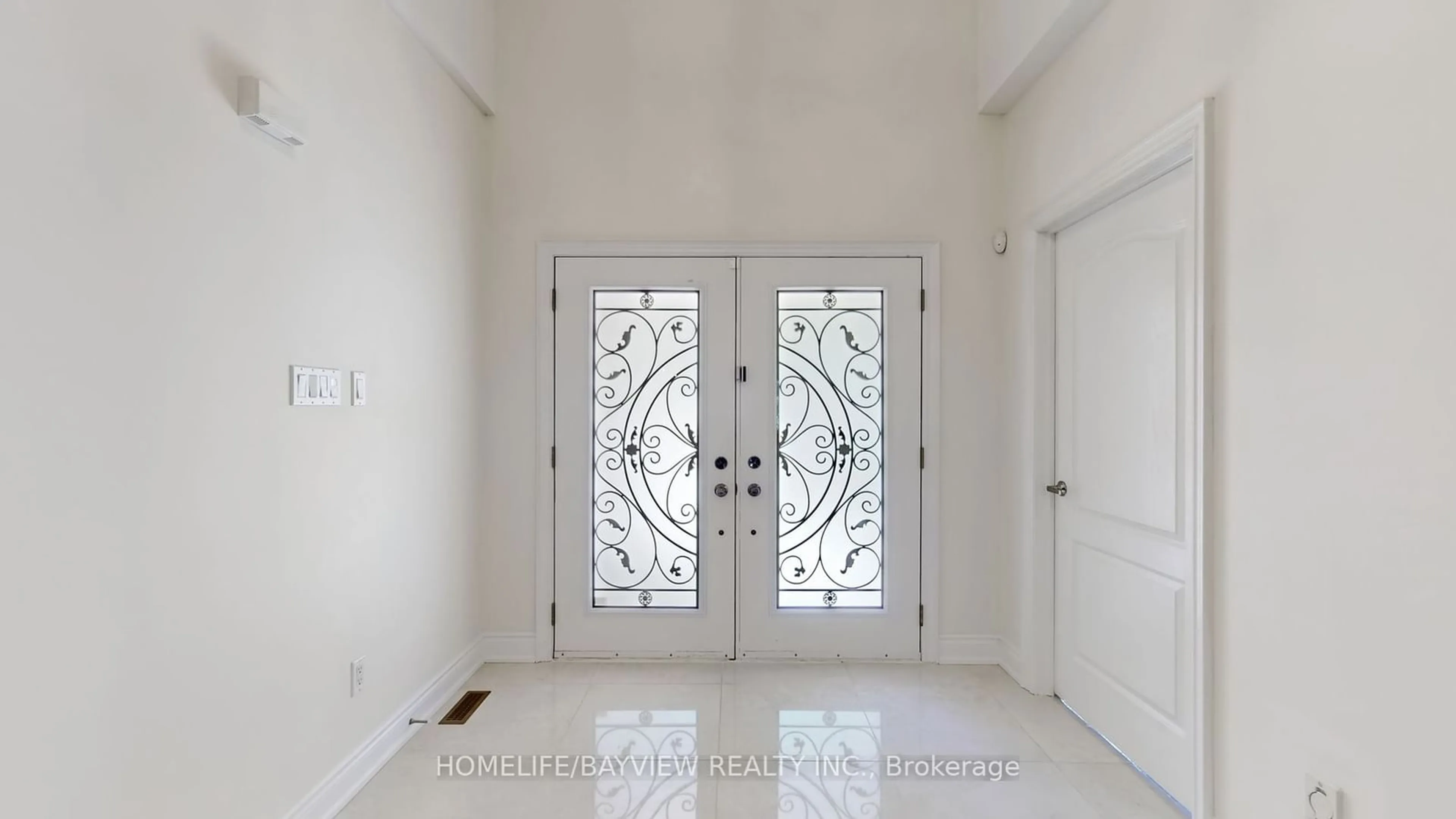 Indoor entryway, wood floors for 19 Warden Woods Crt, Markham Ontario L3R 5W5