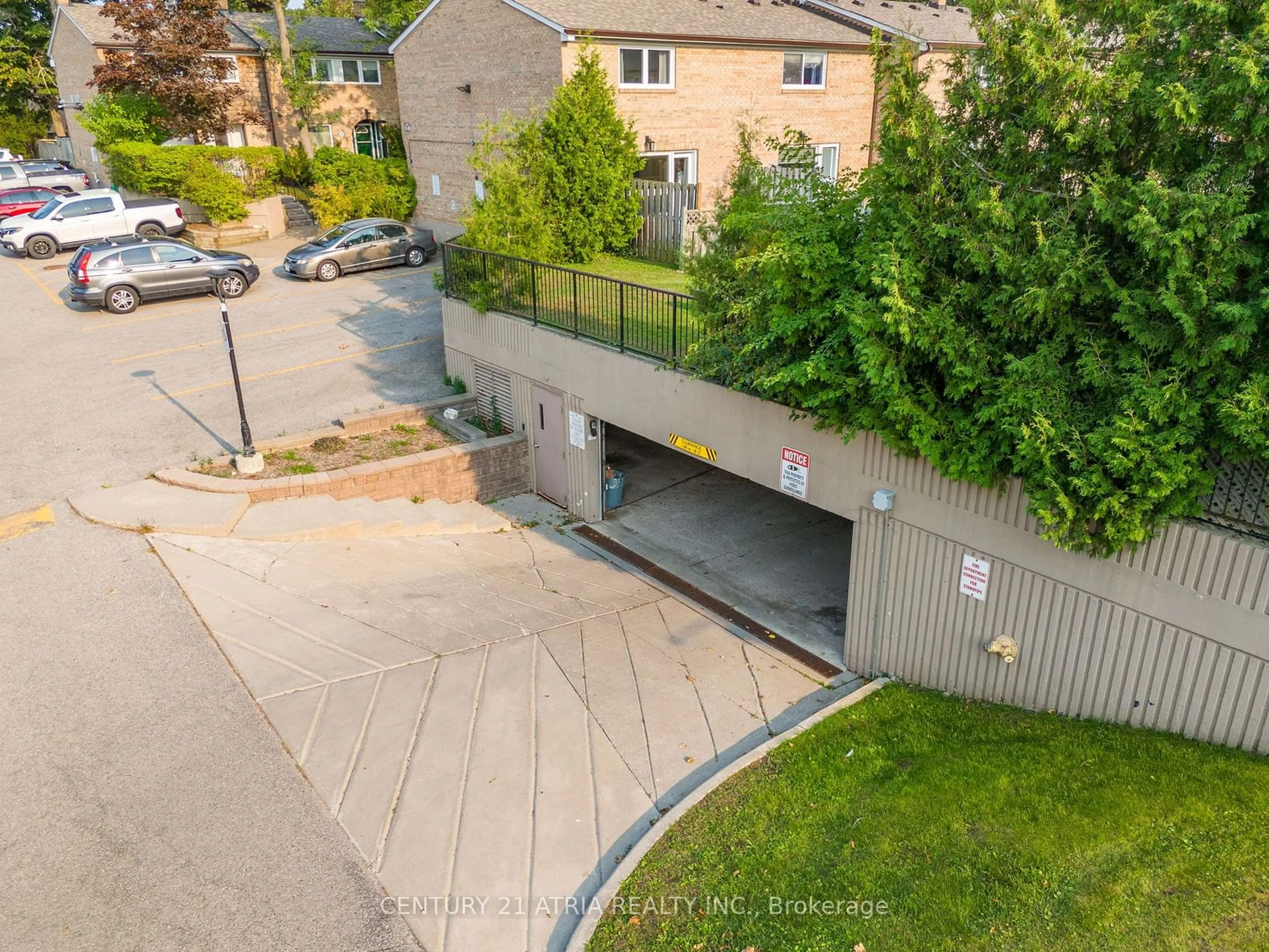 Frontside or backside of a home, the fenced backyard for 1 Wootten Way #45, Markham Ontario L3P 3H7