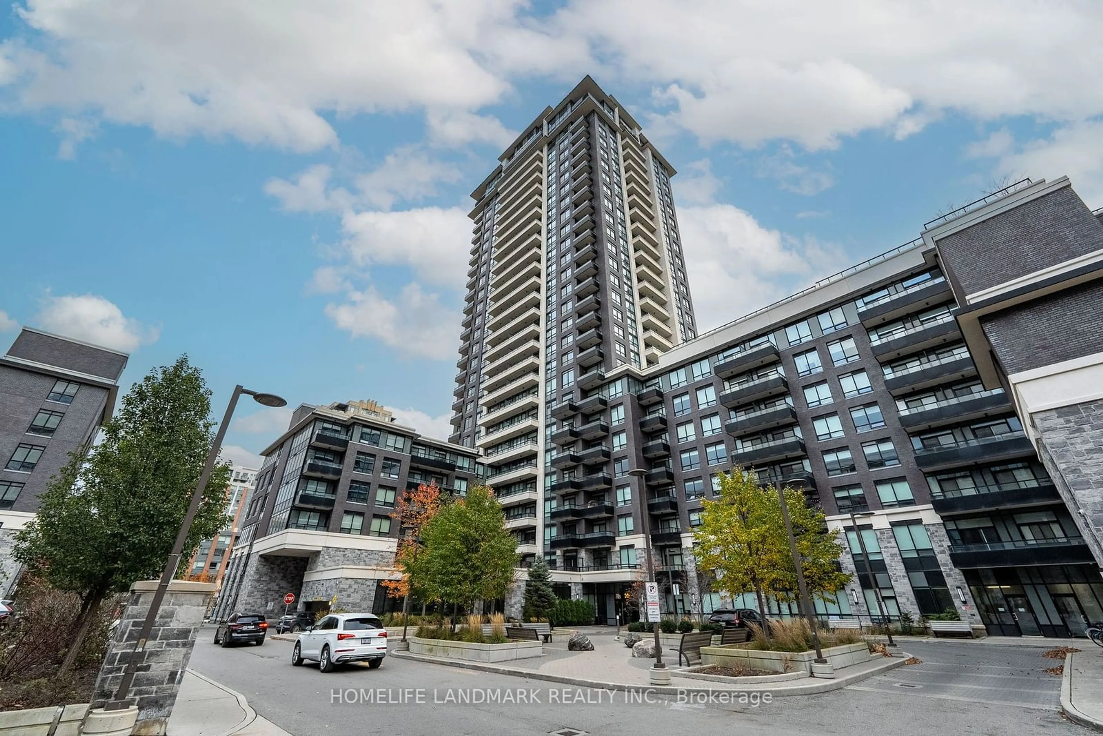 A pic from exterior of the house or condo, the street view for 15 Water Walk Dr #1909, Markham Ontario L6G 0G2