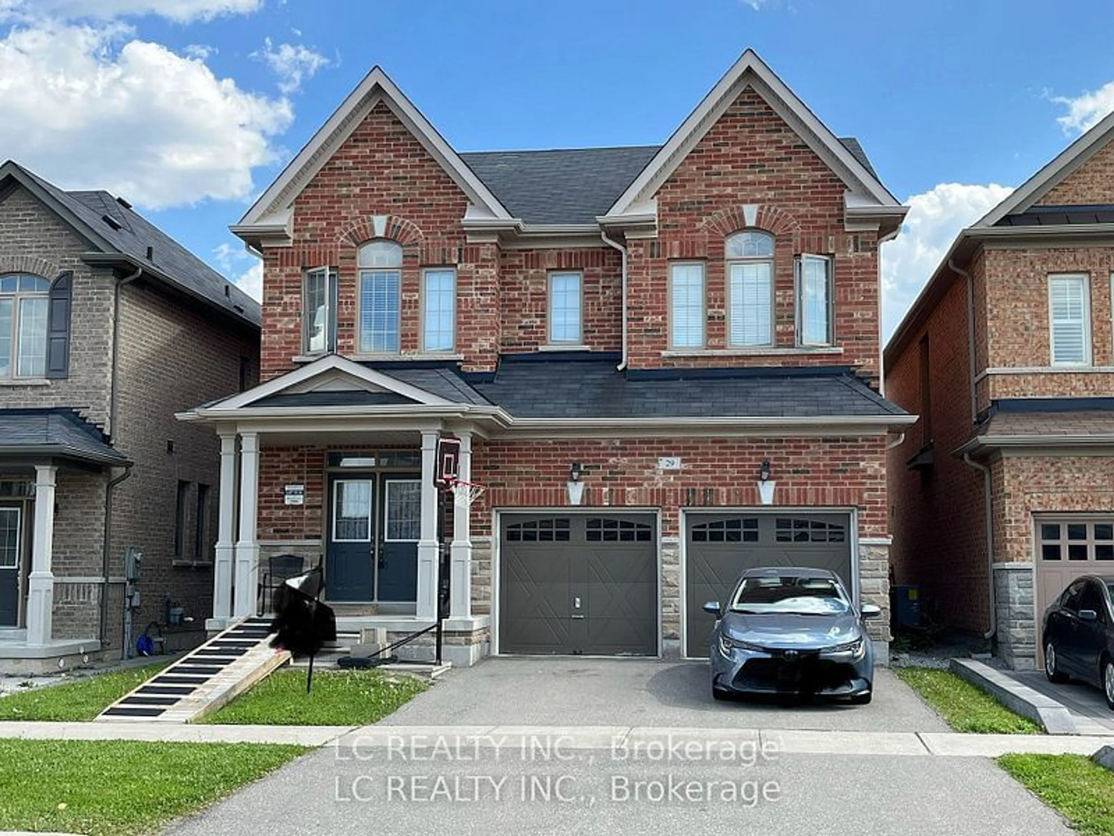 Home with brick exterior material for 29 Wilfred Murison Ave, Markham Ontario L6C 1N7