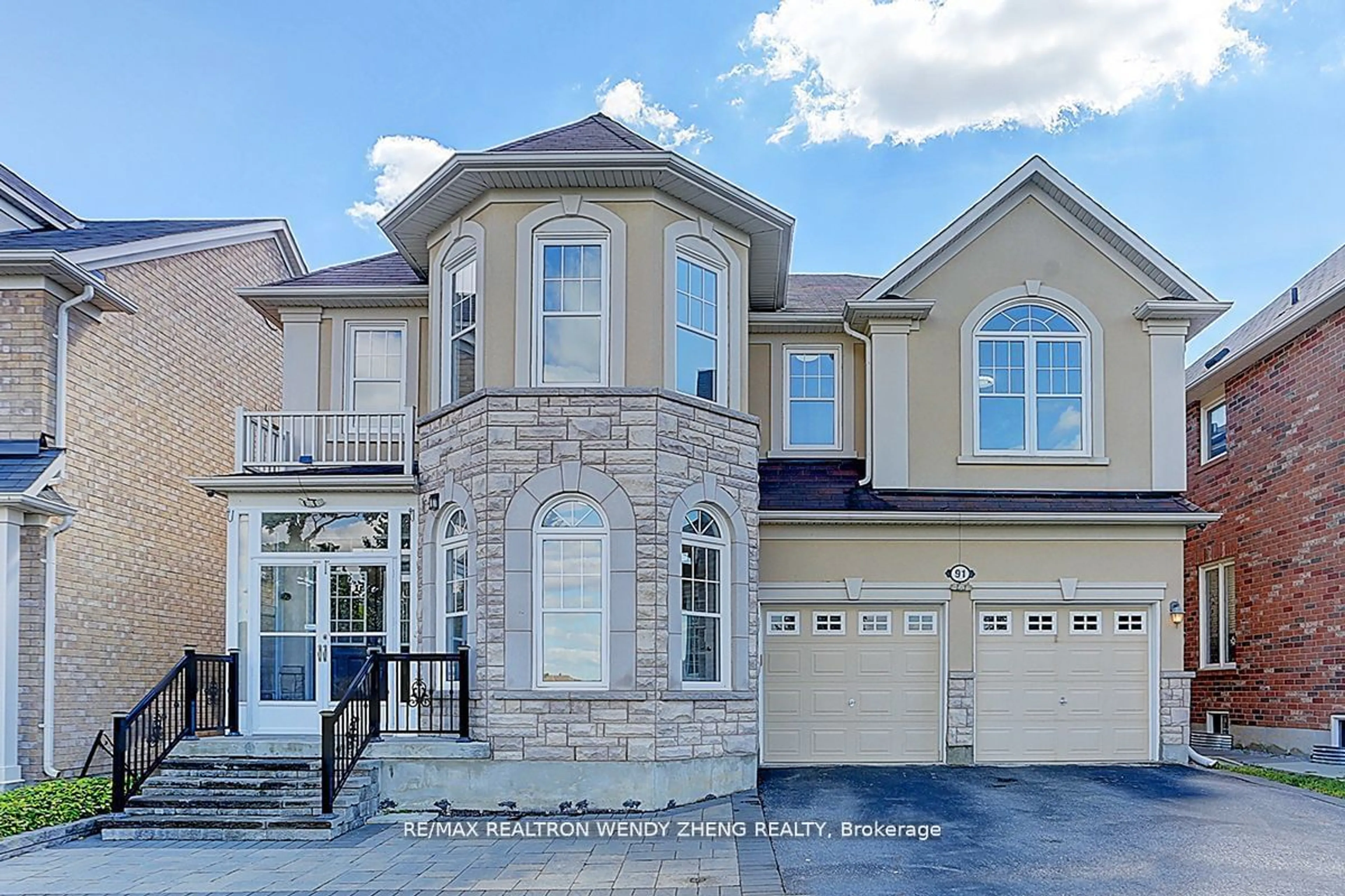 Frontside or backside of a home, the street view for 91 James Parrott Ave, Markham Ontario L6E 2B3