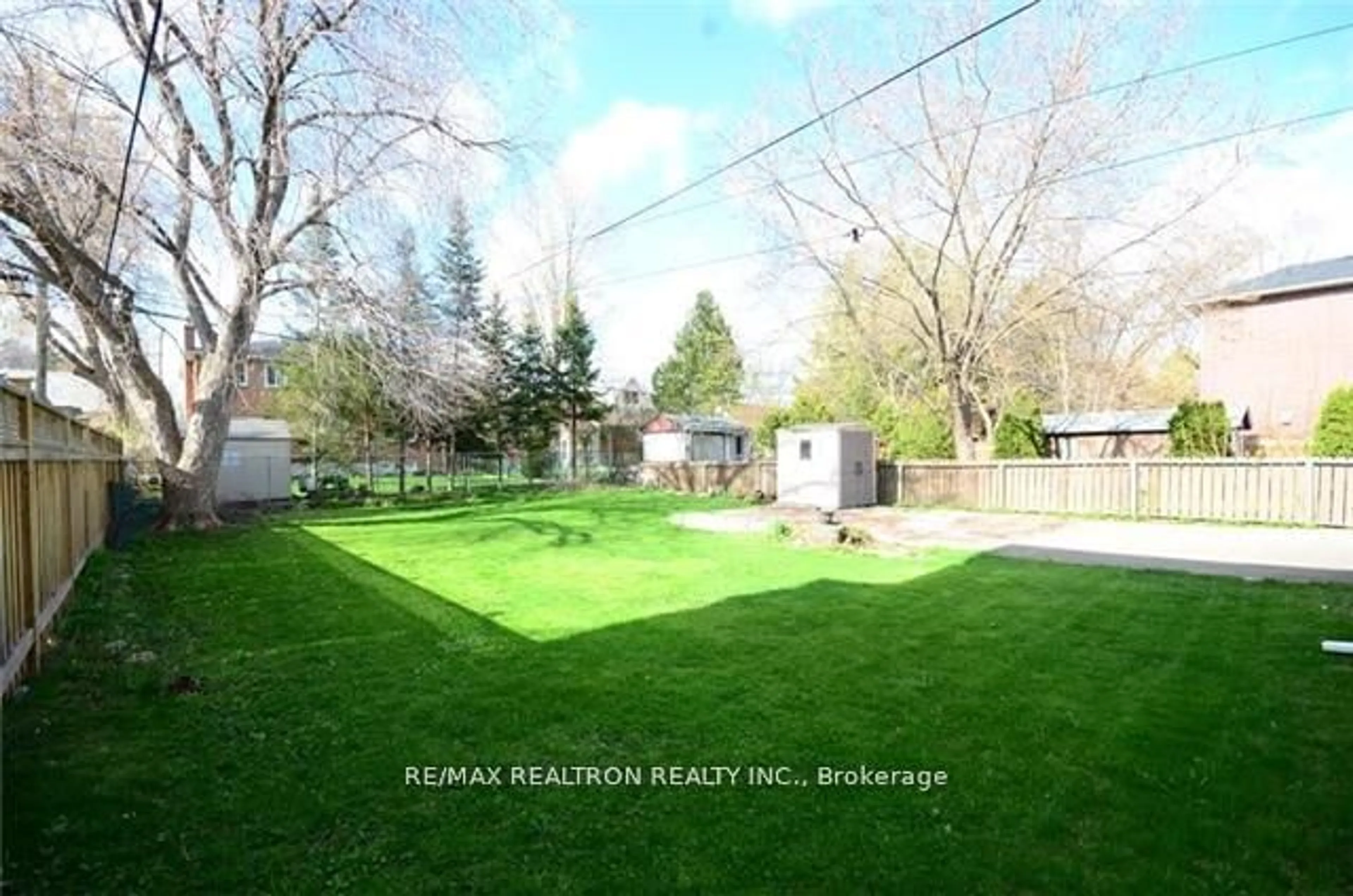 Patio, the fenced backyard for 44 Woodward Ave, Markham Ontario L3T 1E5