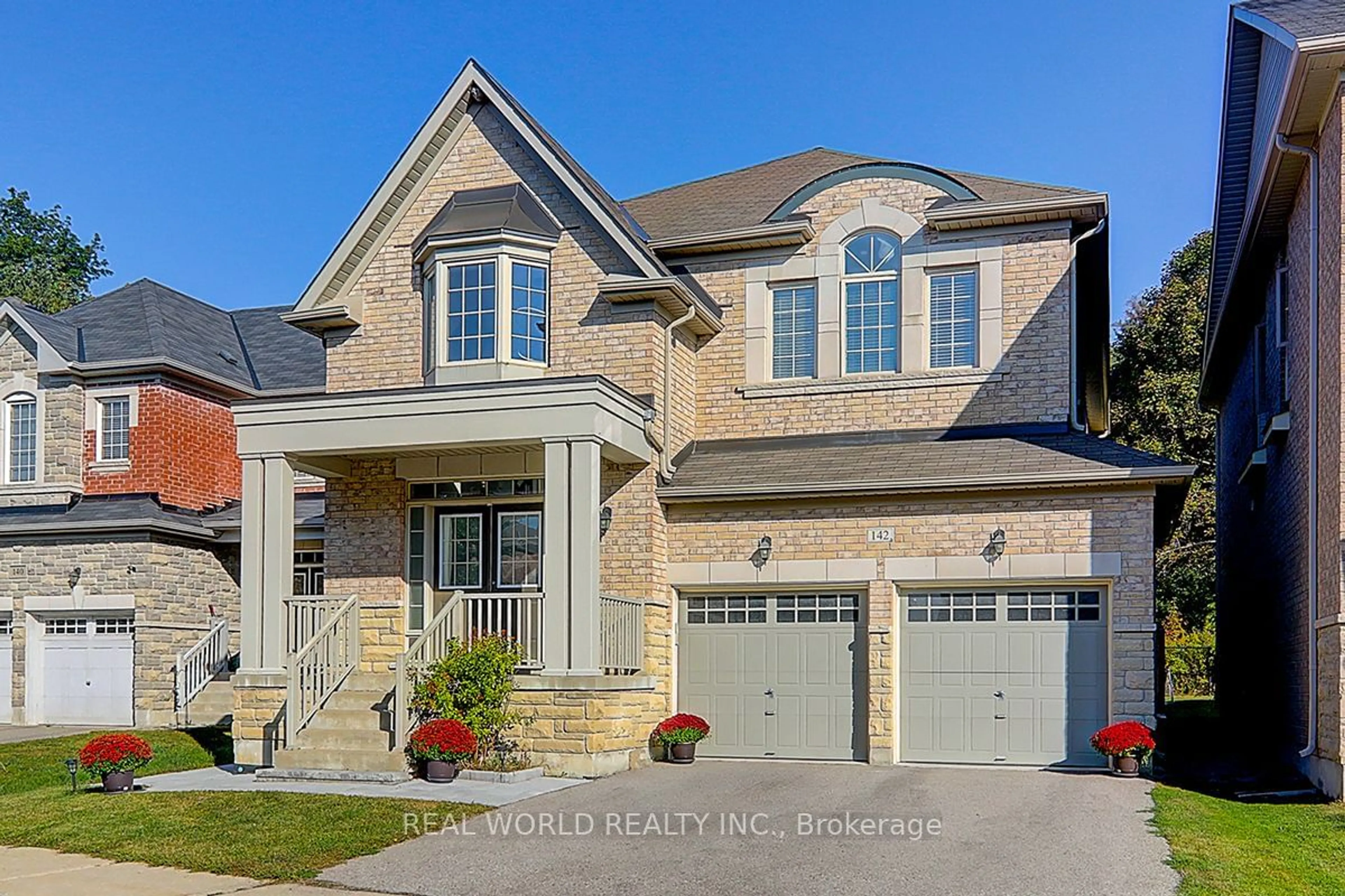 Home with brick exterior material for 142 Riding Mountain Dr, Richmond Hill Ontario L4E 0T9