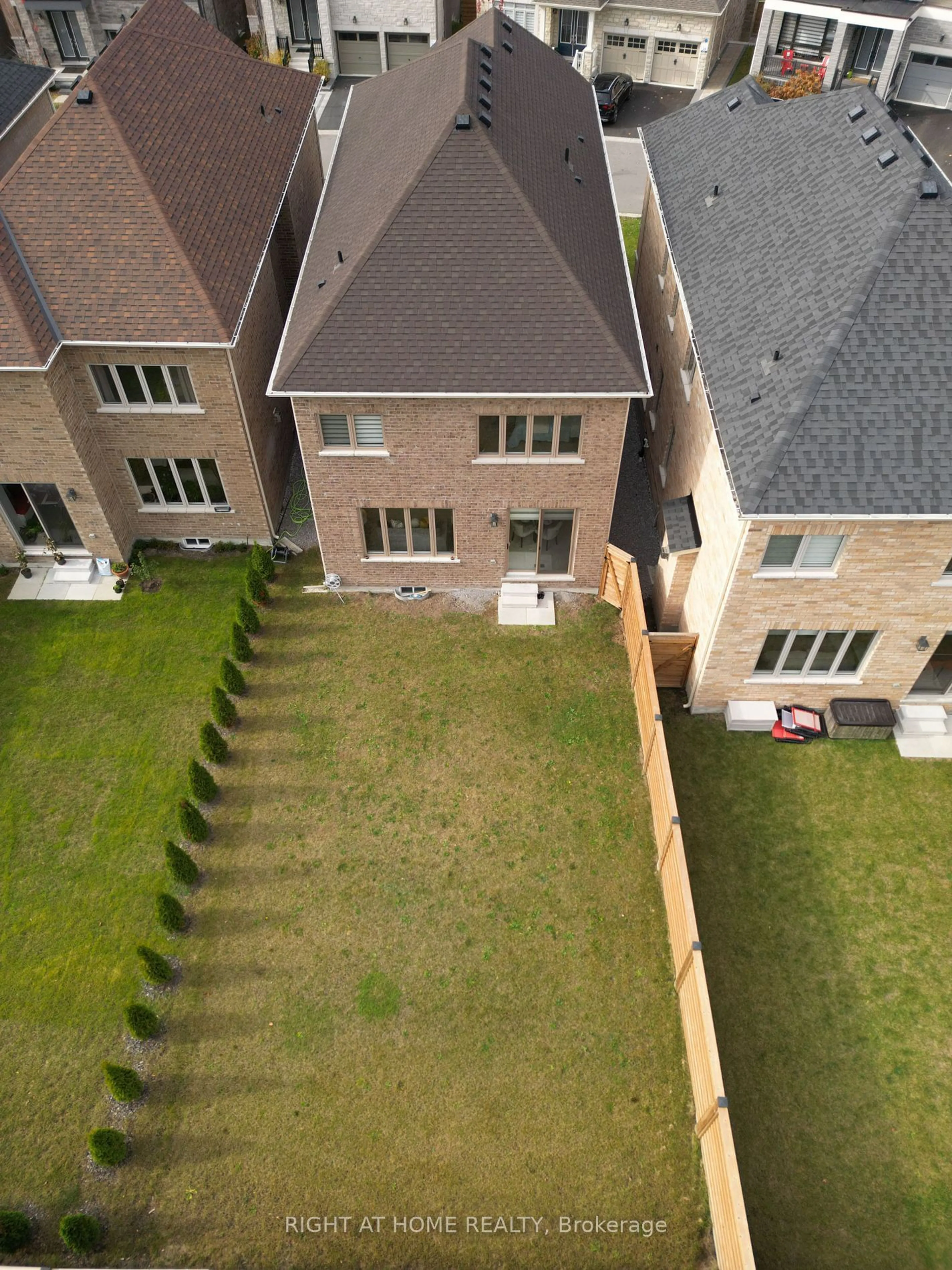 Frontside or backside of a home, the fenced backyard for 31 Pine Hill Cres, Aurora Ontario L4G 3X9