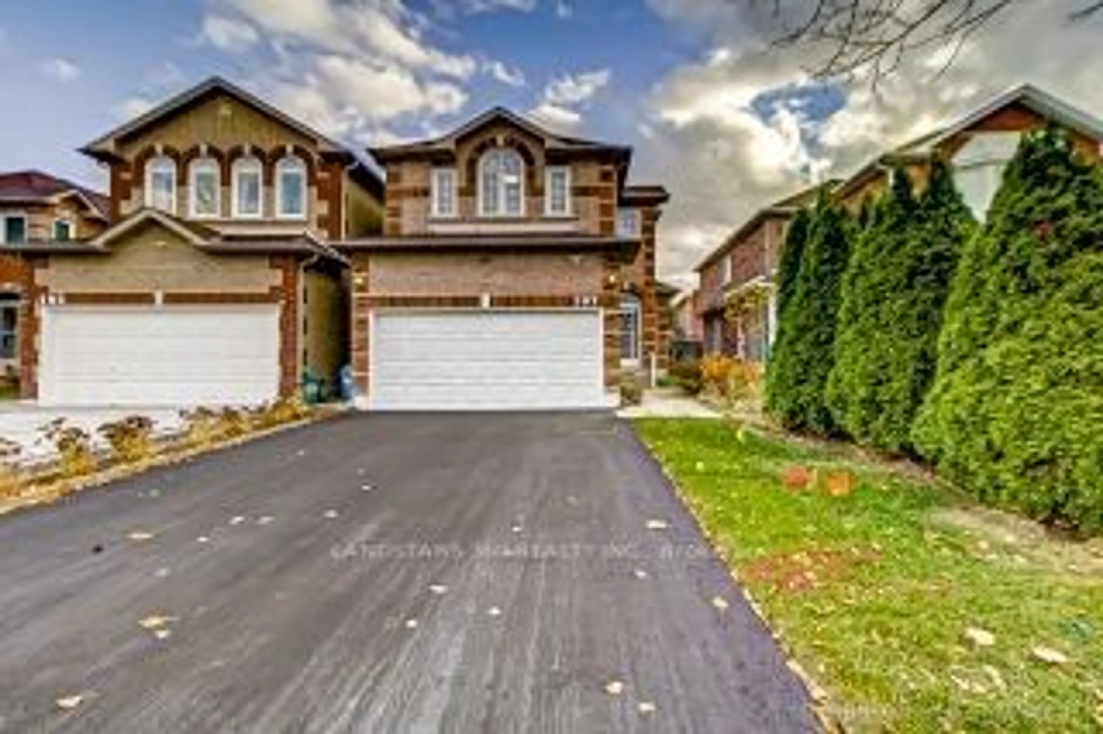 A pic from exterior of the house or condo, the street view for 107 Greensboro Dr, Markham Ontario L3R 0V8