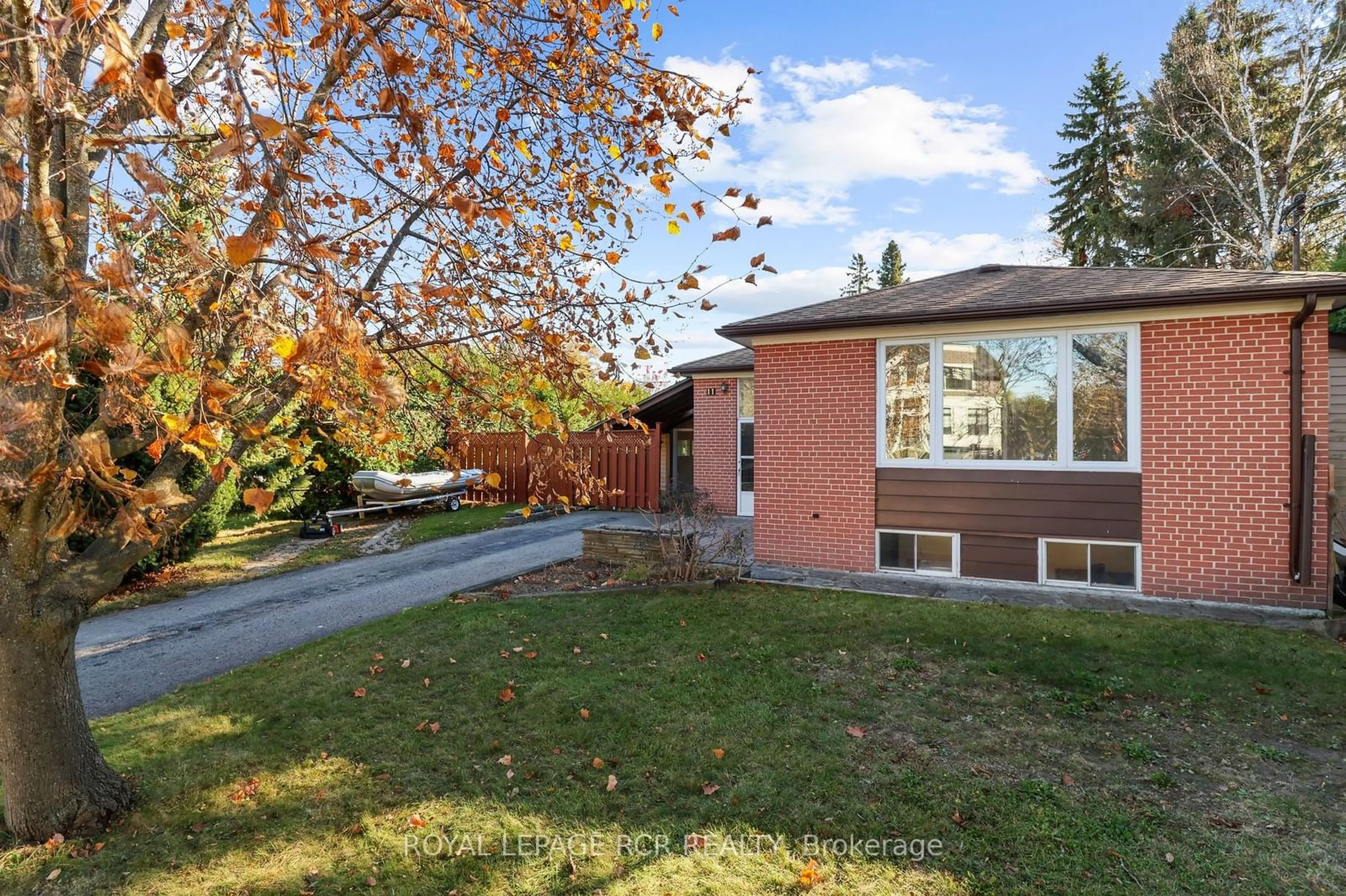 A pic from exterior of the house or condo, the fenced backyard for 11 Johnson Rd, Aurora Ontario L4G 2A3