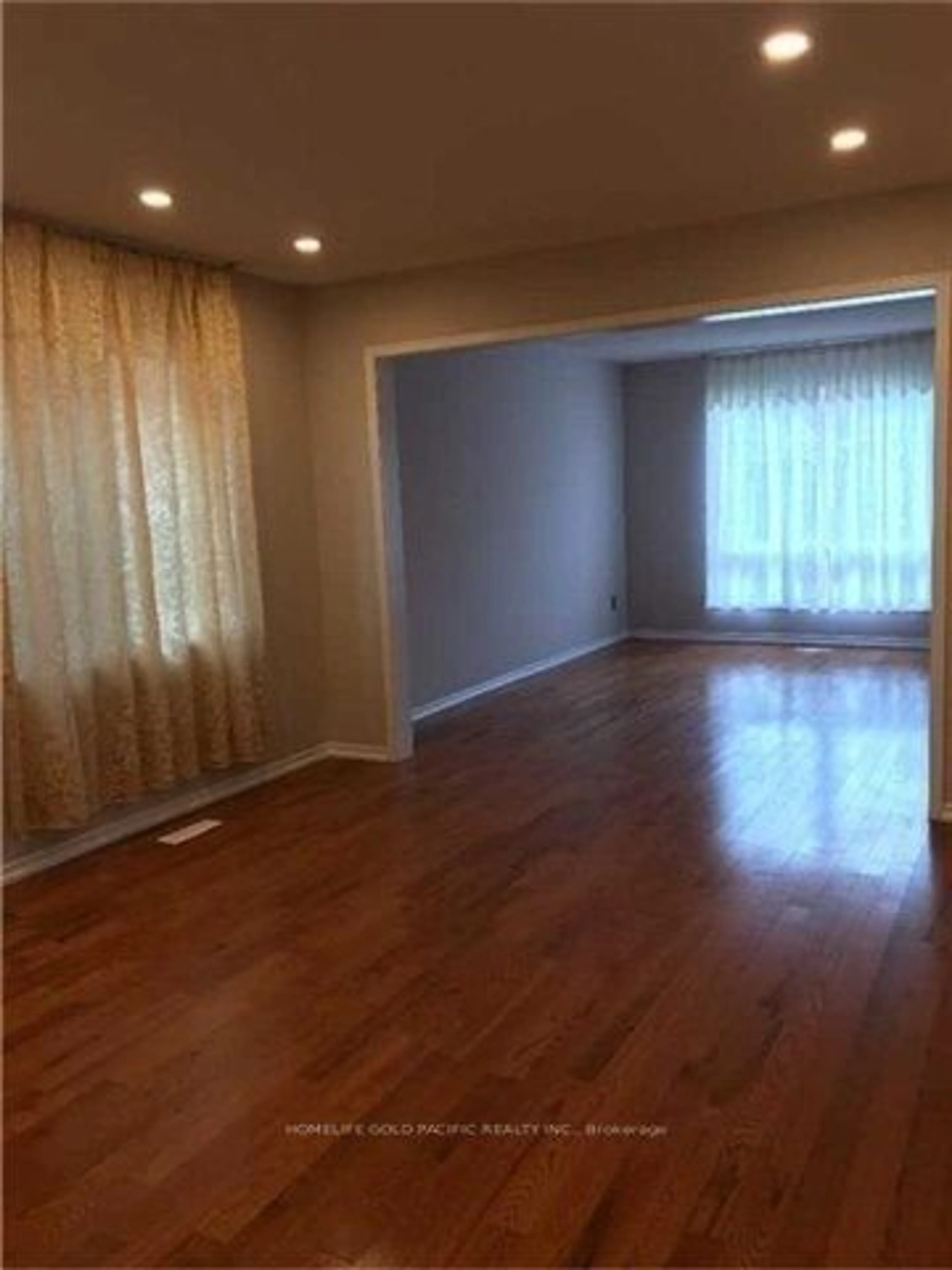 A pic of a room, wood floors for 65 Loring Cres, Markham Ontario L3R 0G2