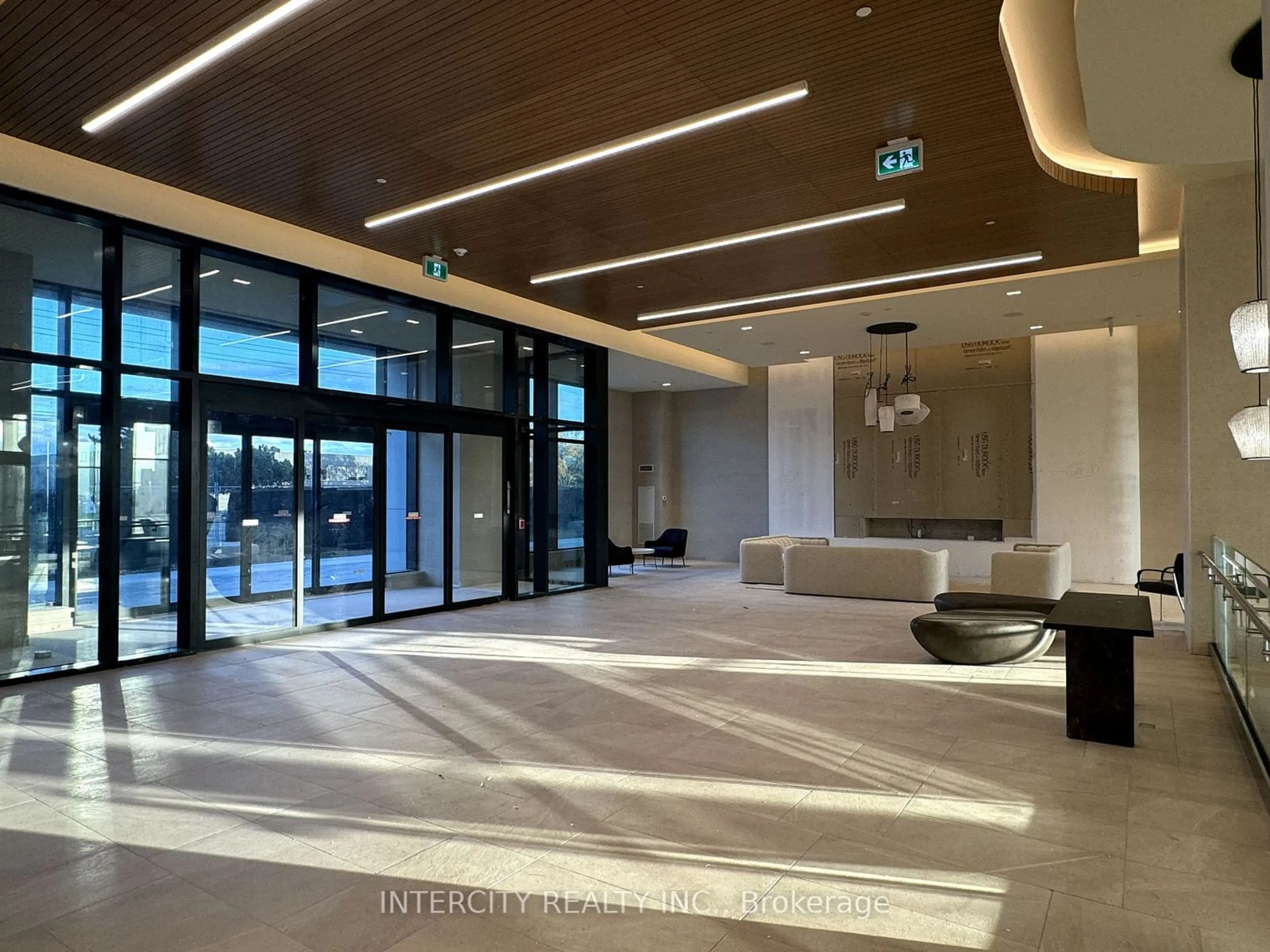 Indoor lobby, cement floor for 8960 Jane St #215, Vaughan Ontario L4K 2M9