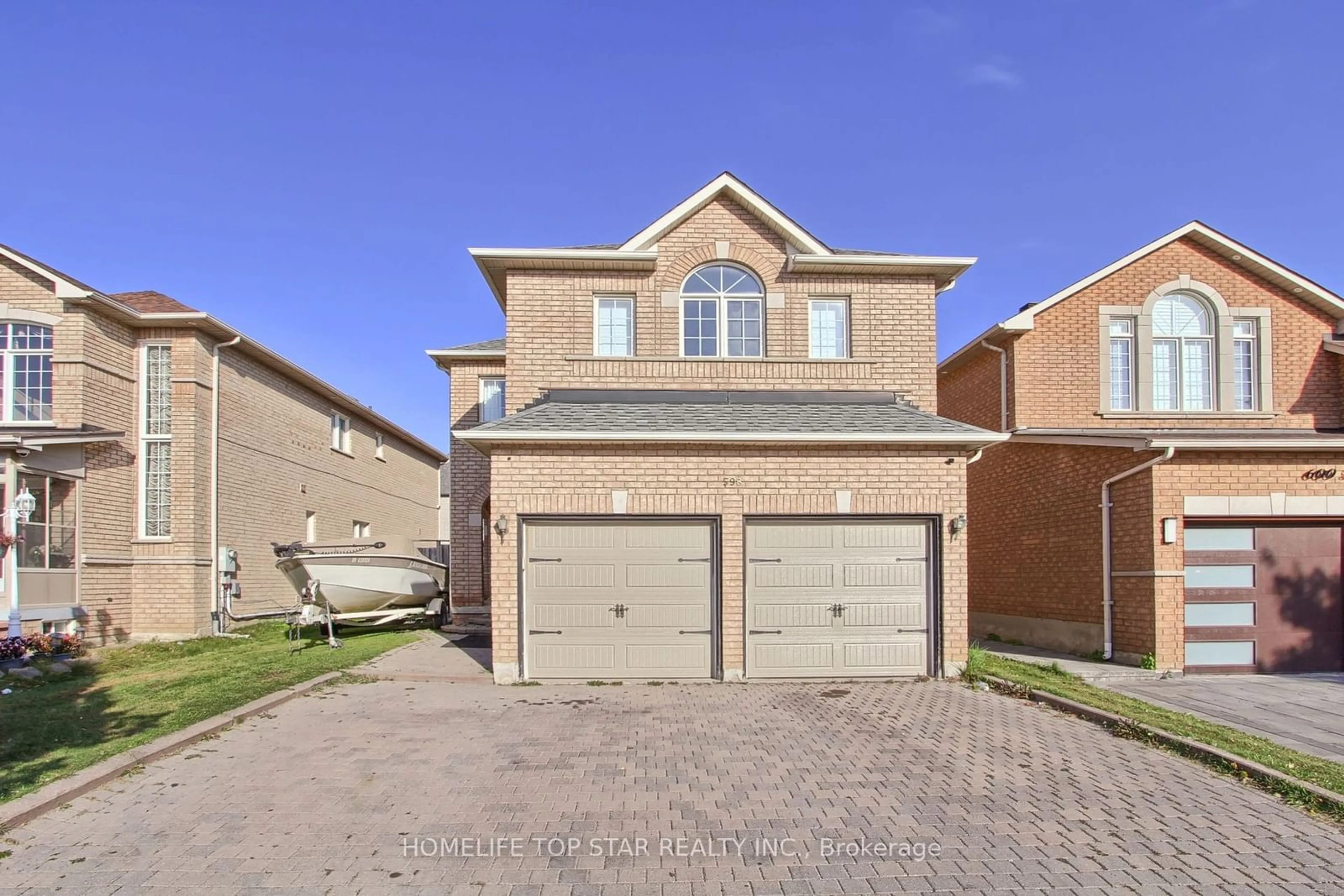 Frontside or backside of a home, the street view for 598 Highglen Ave, Markham Ontario L3S 4N5