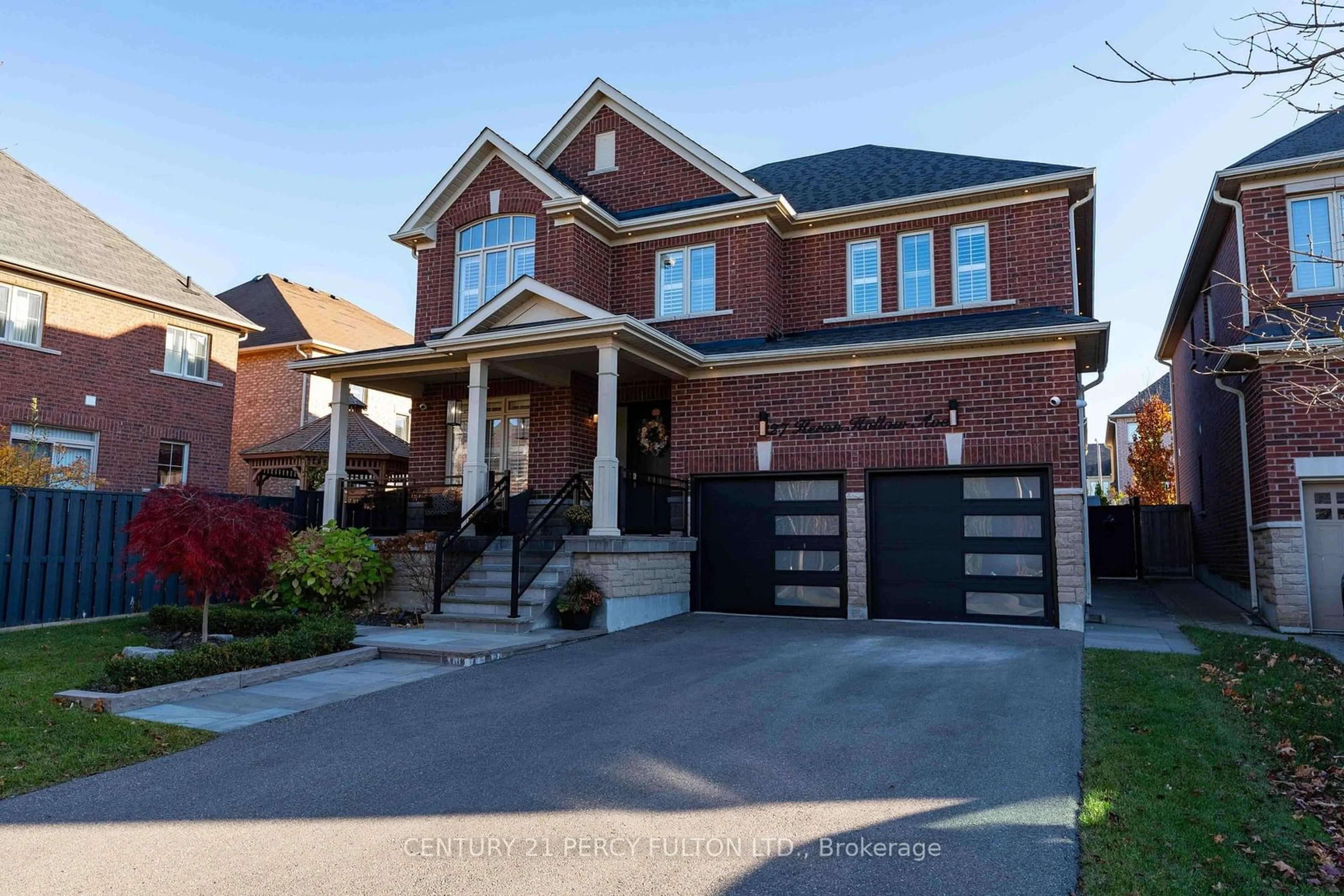 Home with brick exterior material for 27 Heron Hollow Ave, Richmond Hill Ontario L4E 0V7