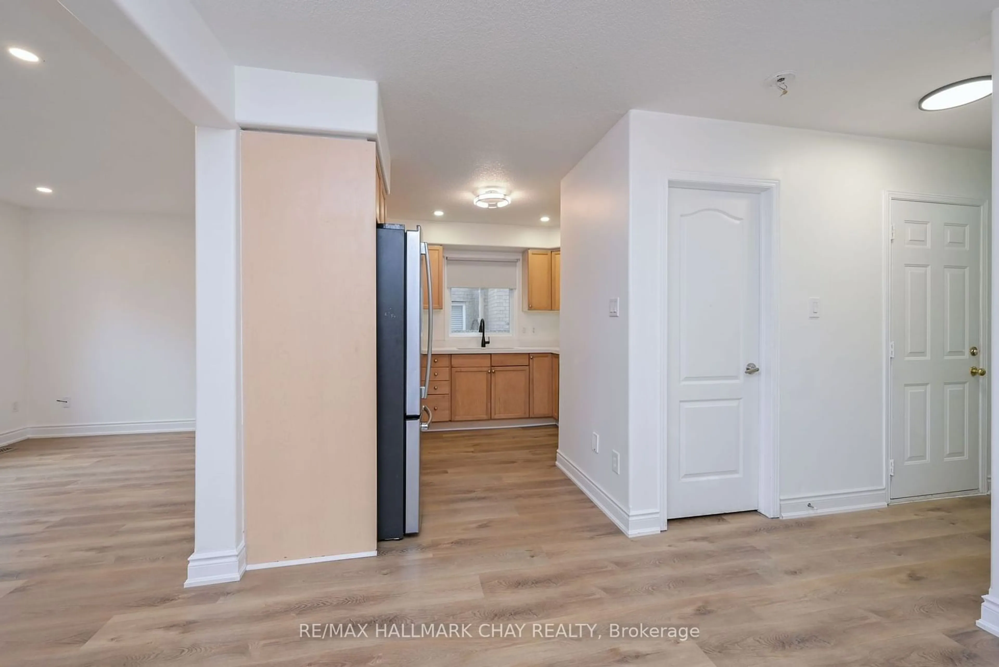 A pic of a room, wood floors for 24 Stoneham St, New Tecumseth Ontario L9R 2C9