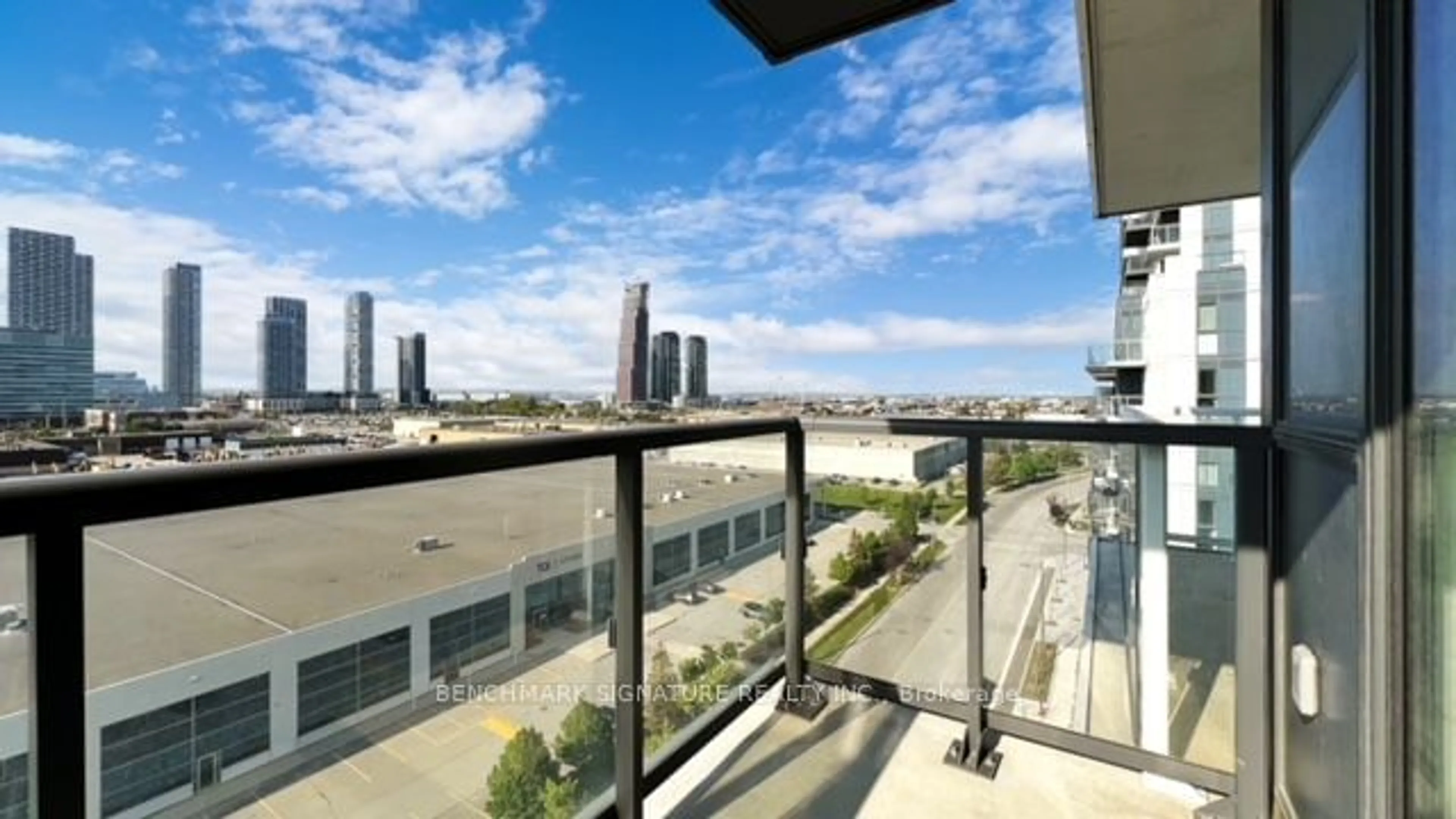 Balcony in the apartment, the view of city buildings for 10 Honeycrisp Cres #1001, Vaughan Ontario L4K 0M7