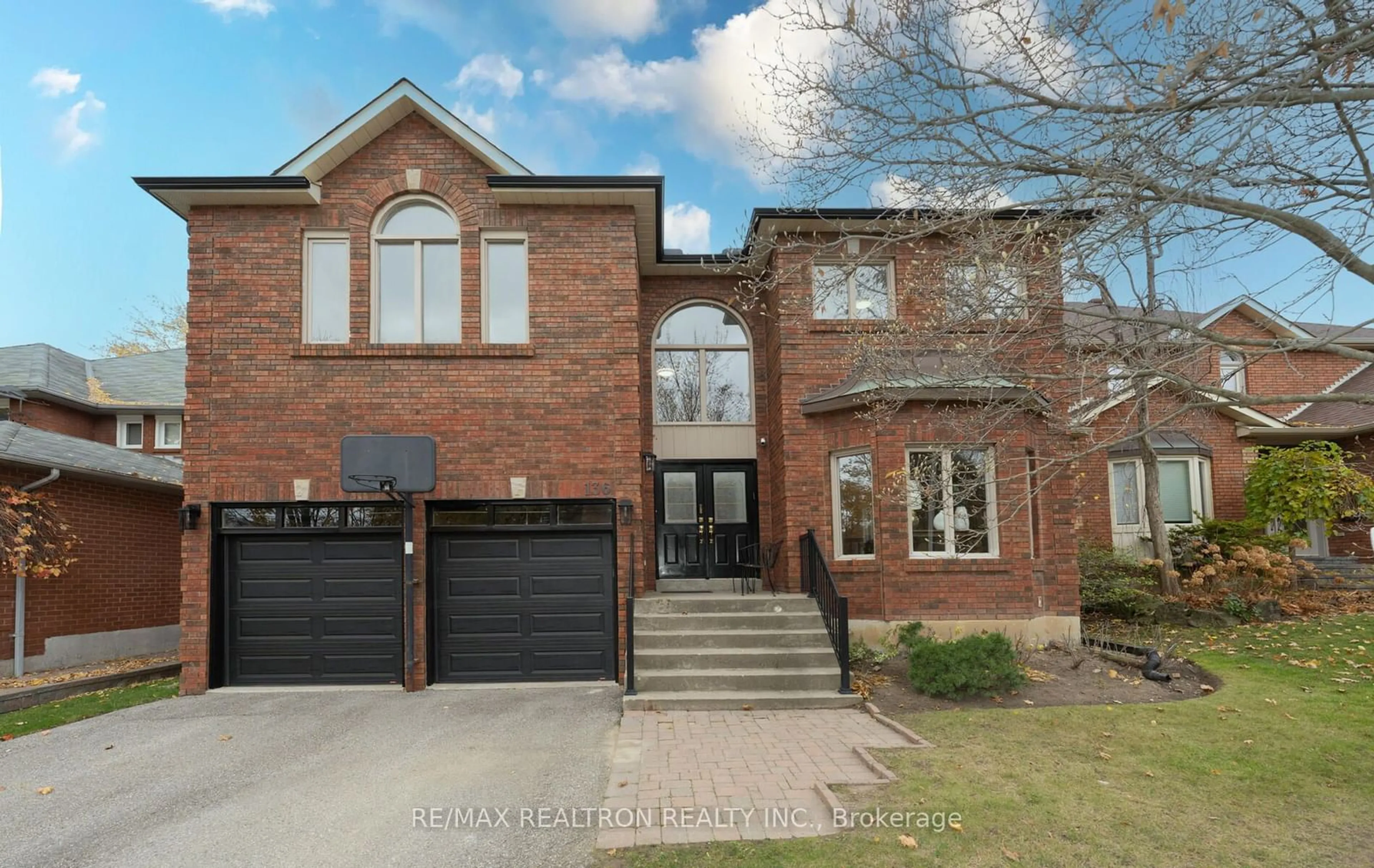 Home with brick exterior material for 136 Markwood Lane, Vaughan Ontario L4J 7K6