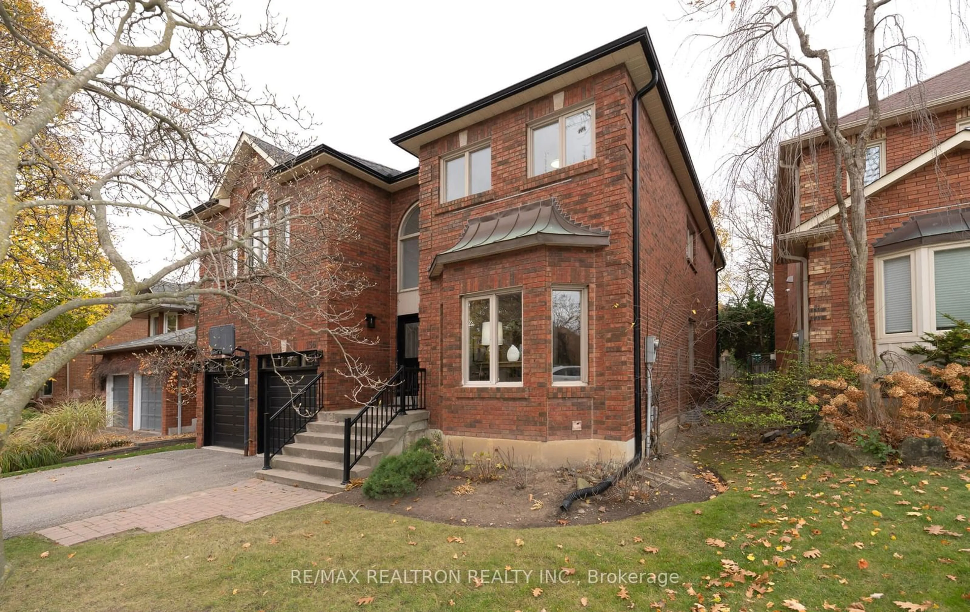 Home with brick exterior material for 136 Markwood Lane, Vaughan Ontario L4J 7K6