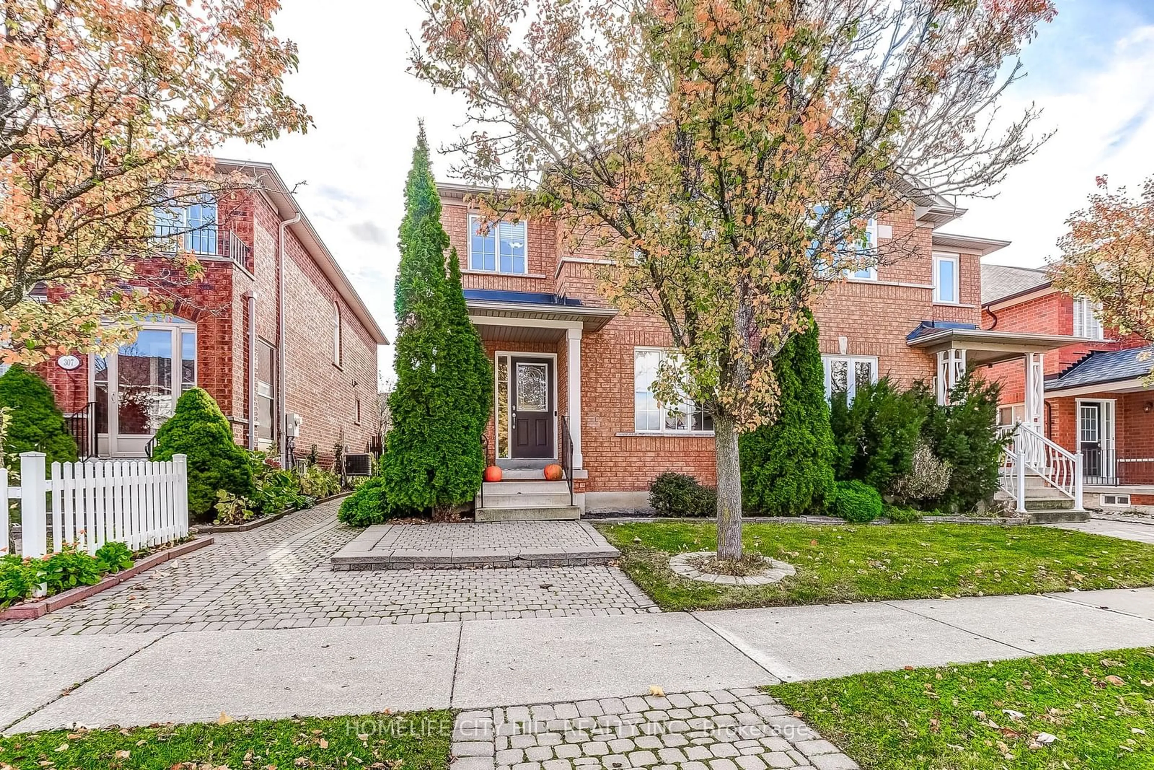 Home with brick exterior material for 303 Via Carmine Ave, Vaughan Ontario L4H 2R4