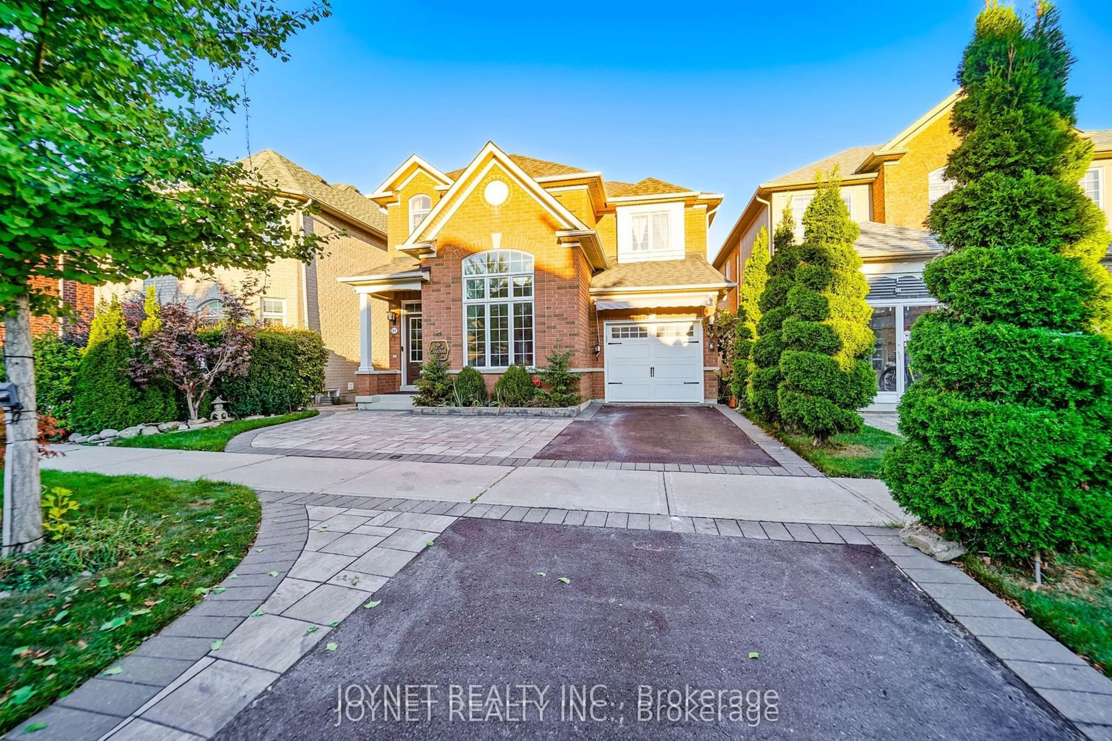 Frontside or backside of a home, the street view for 57 Macadam Rd, Markham Ontario L6E 2C2