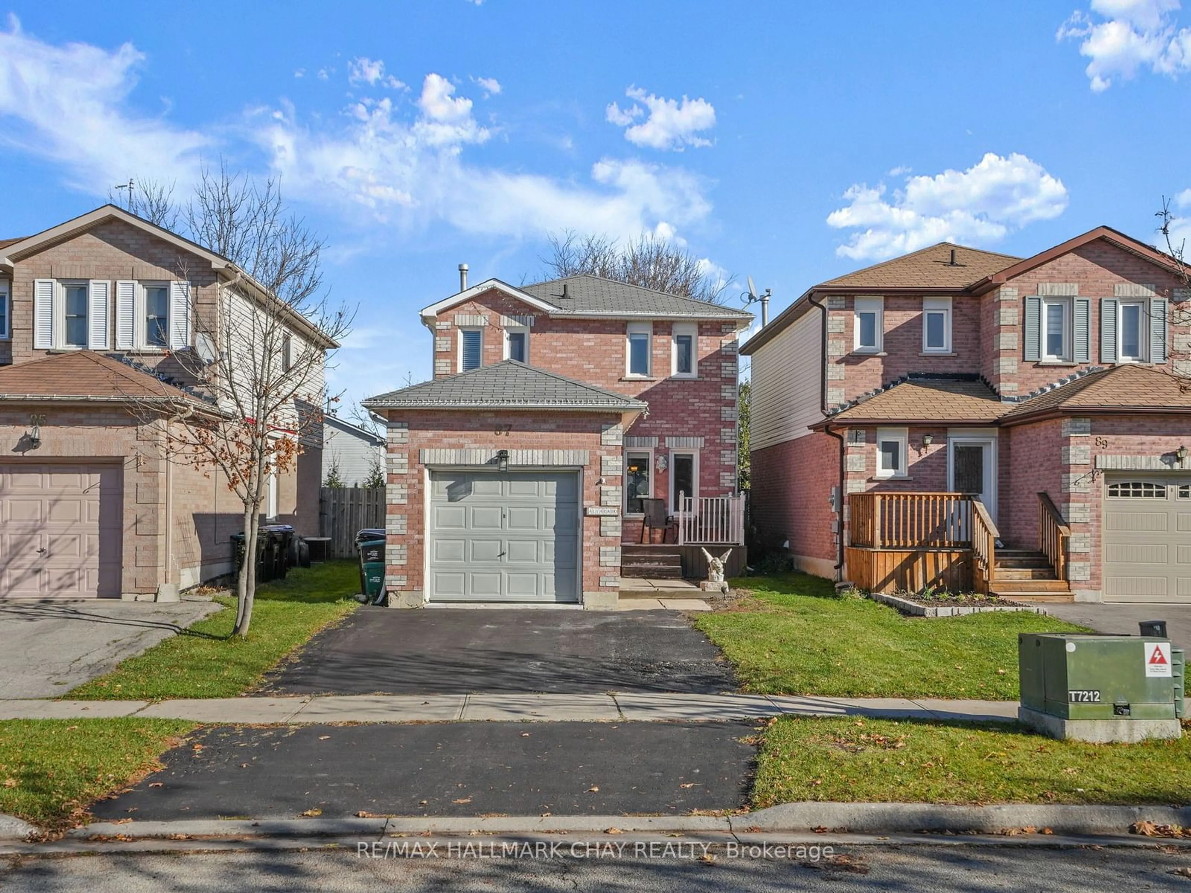 Frontside or backside of a home, the street view for 87 Mcknight Cres, New Tecumseth Ontario L0G 1W0