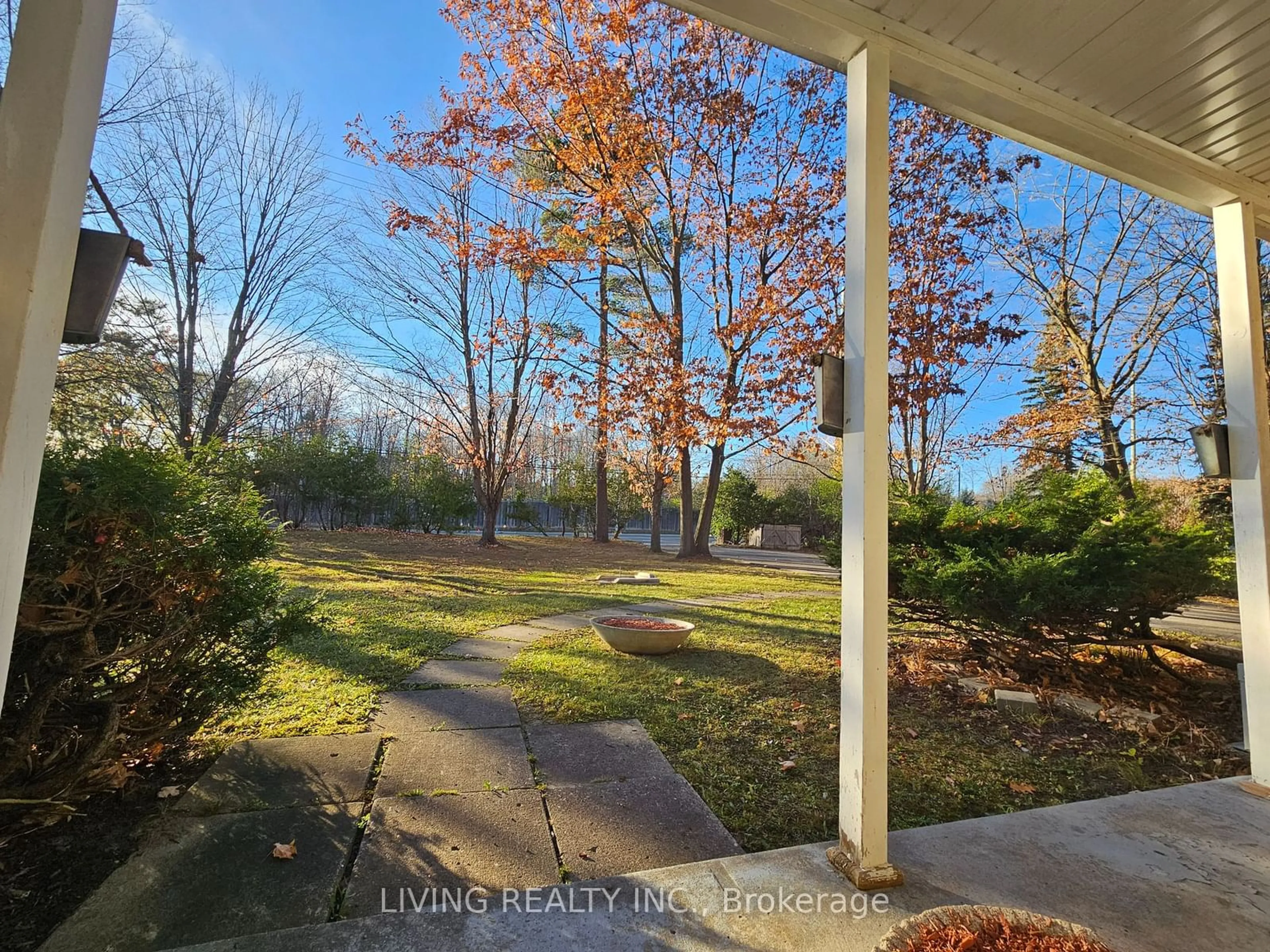 A pic from exterior of the house or condo, the fenced backyard for 9739 Warden Ave, Markham Ontario L6C 1M6